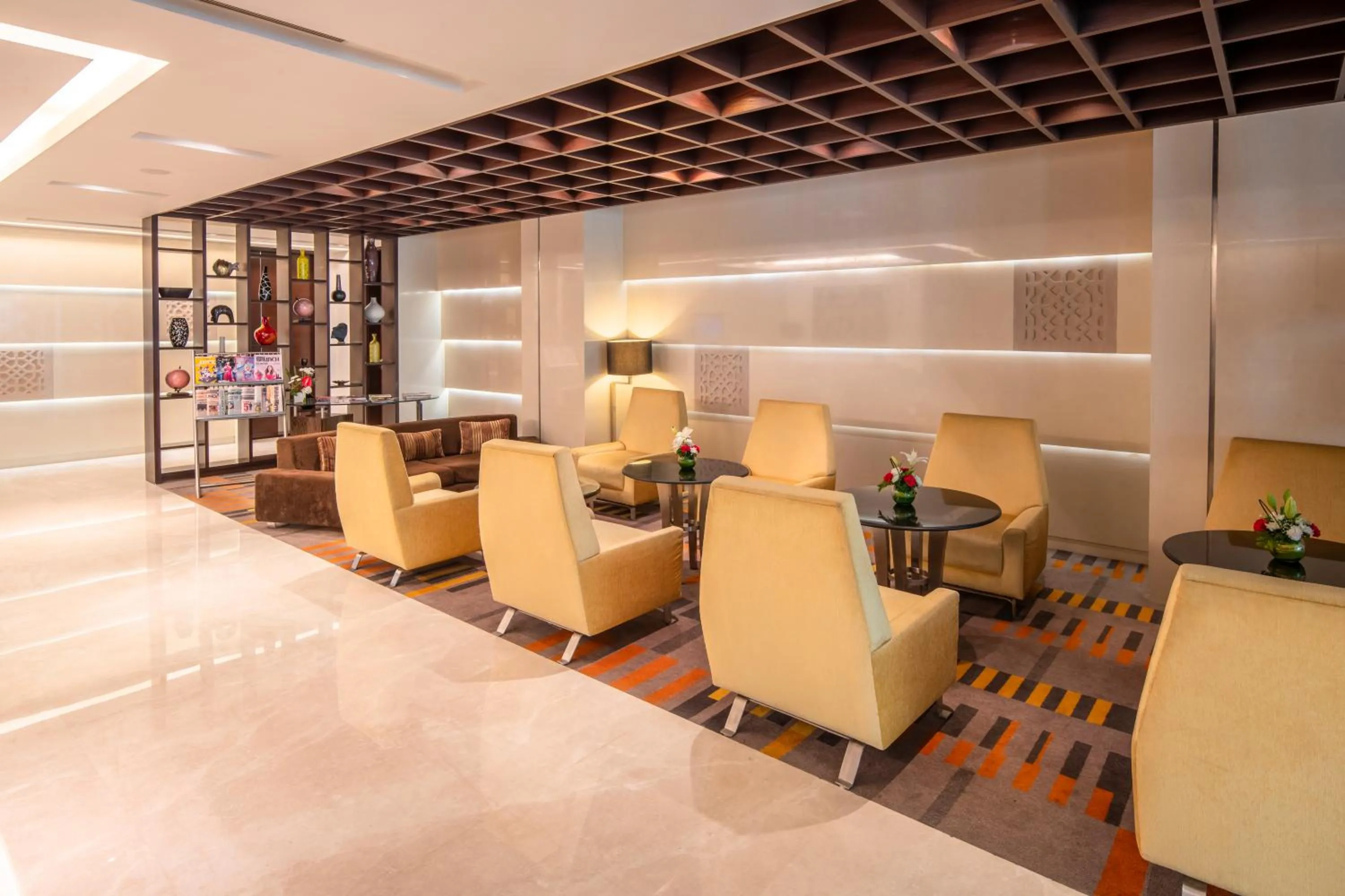 Lounge or bar in Holiday Inn Mumbai International Airport by IHG