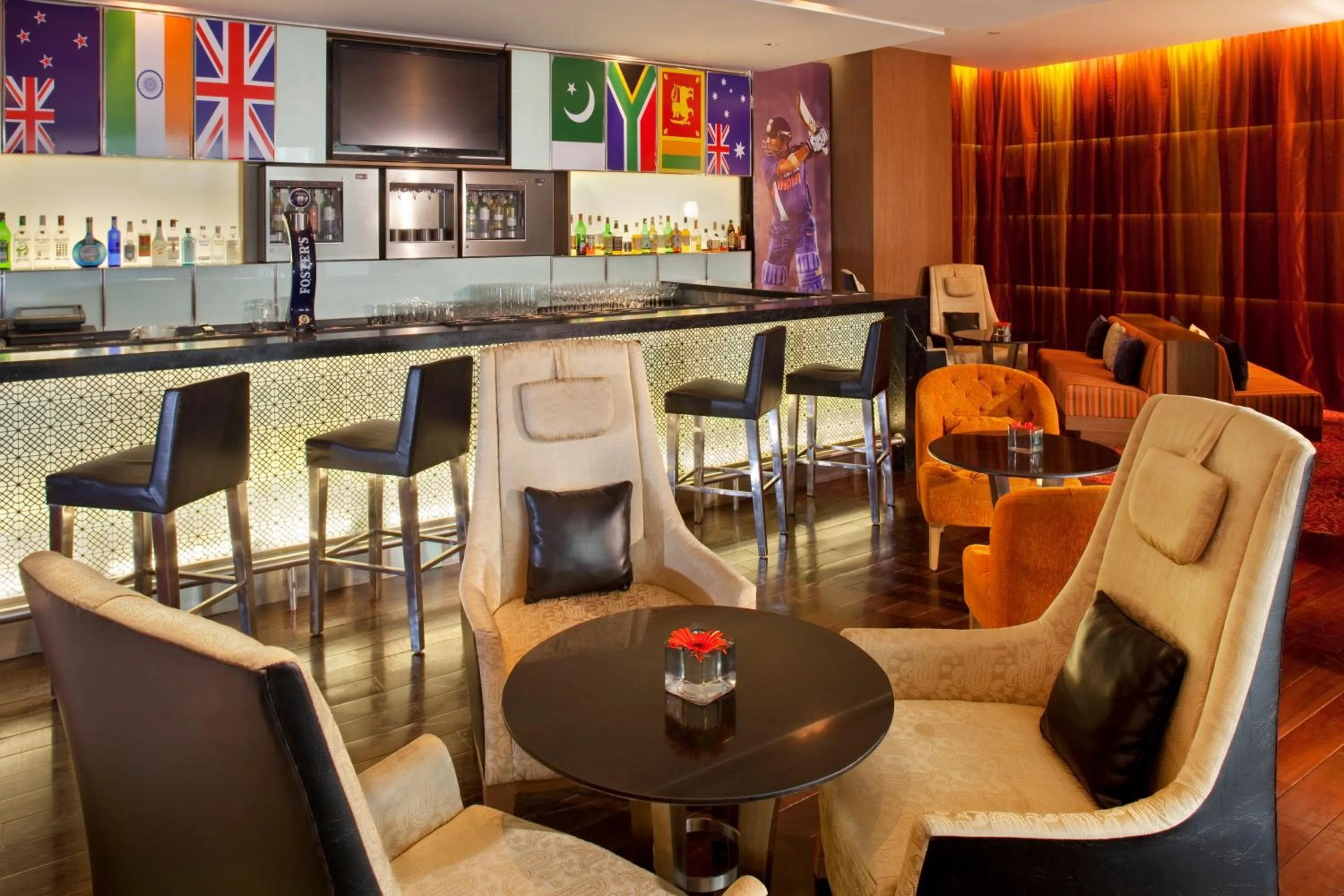 Lounge or bar in Holiday Inn Mumbai International Airport by IHG
