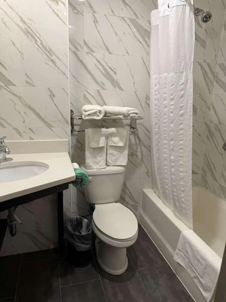 Bathroom in Days Inn by Wyndham Brooklyn Marine Park