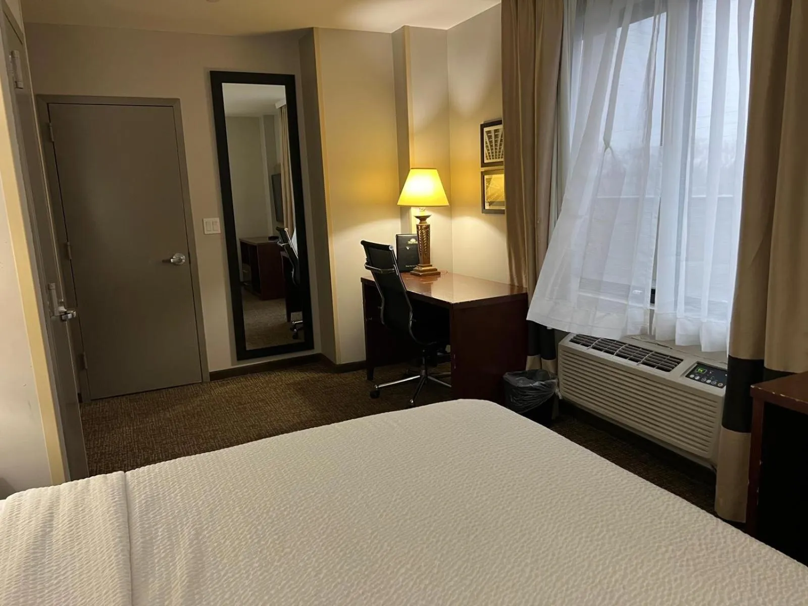 Seating area, Bed in Days Inn by Wyndham Brooklyn Marine Park