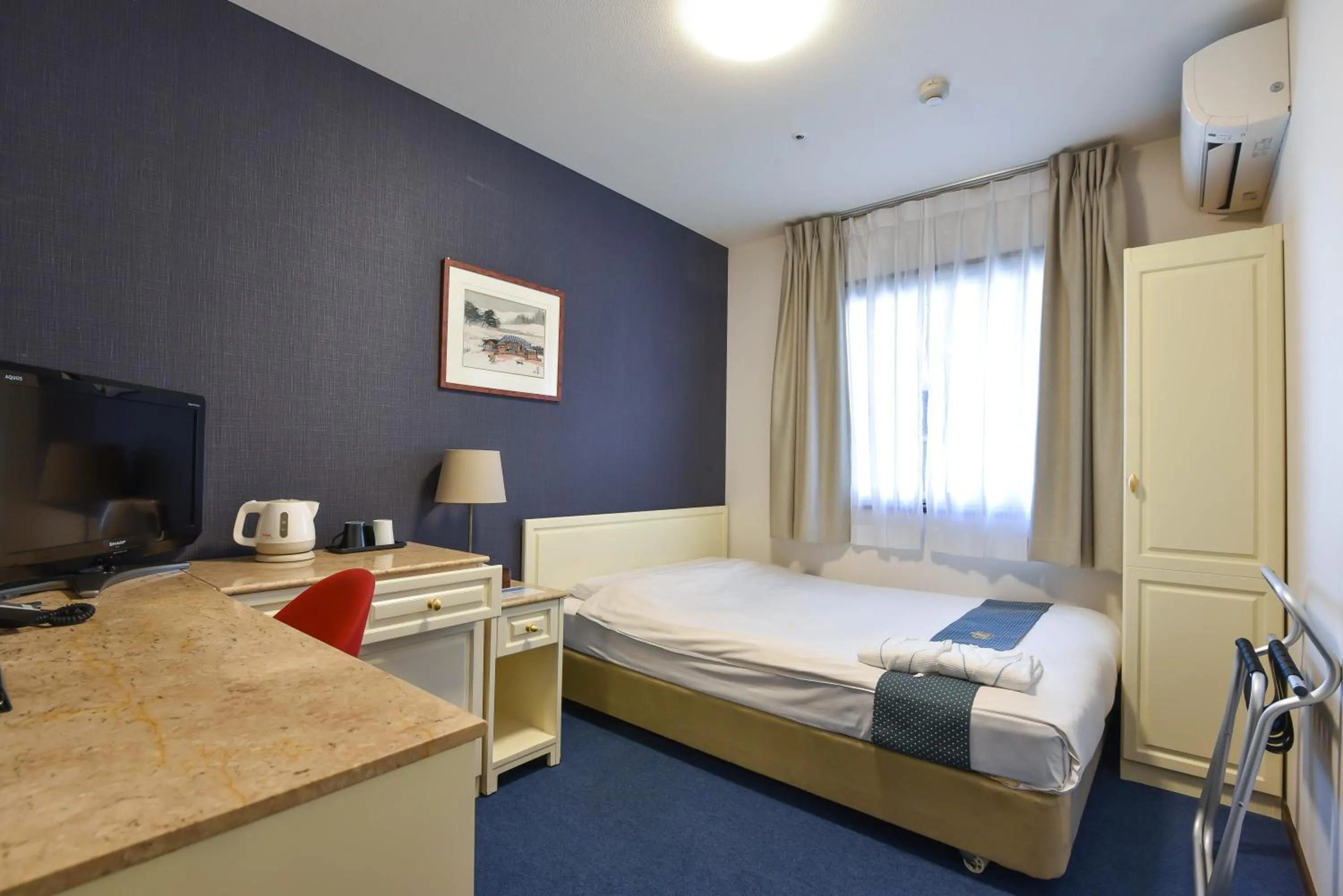 Bed in New Osaka Hotel Shinsaibashi