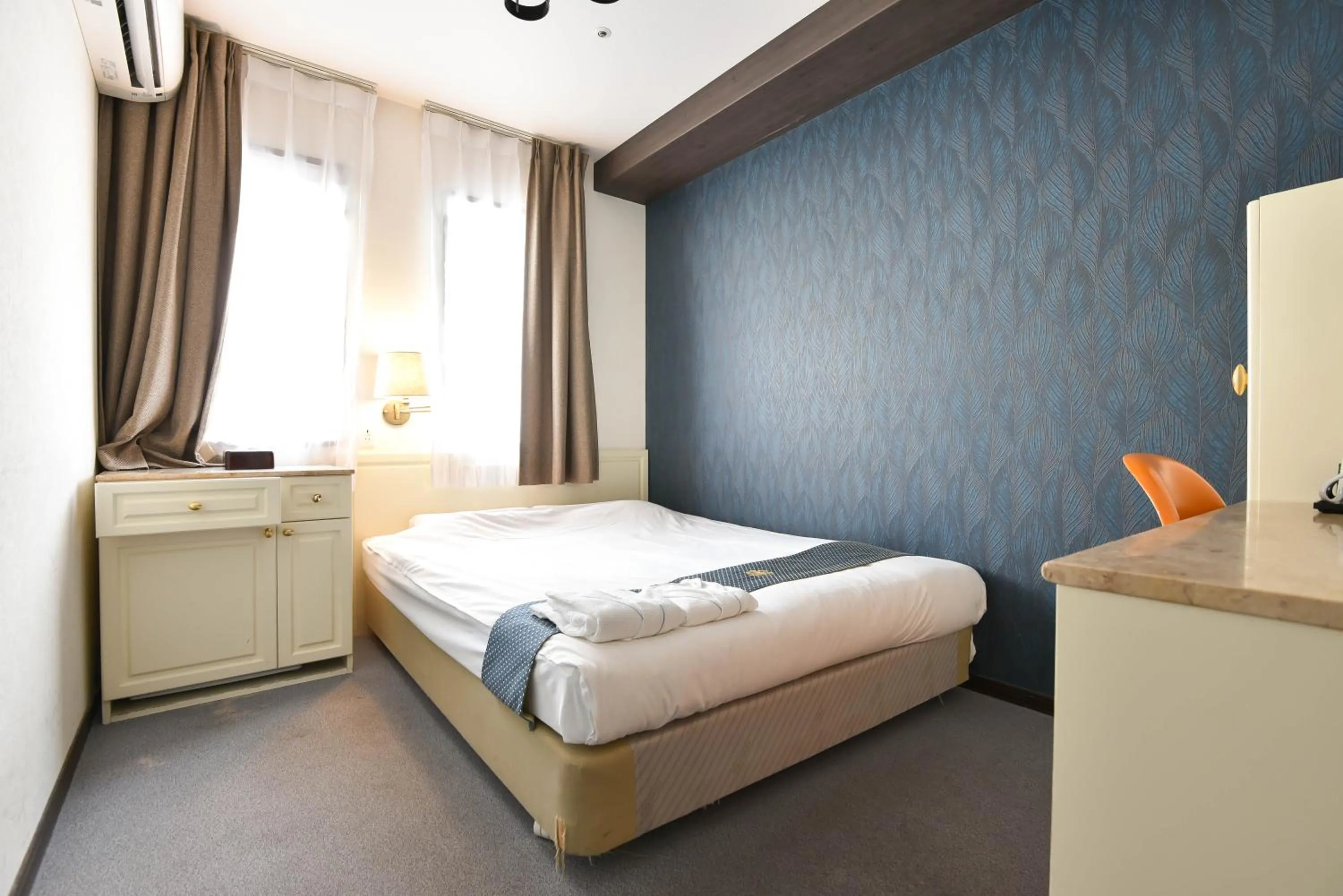 Bed in New Osaka Hotel Shinsaibashi