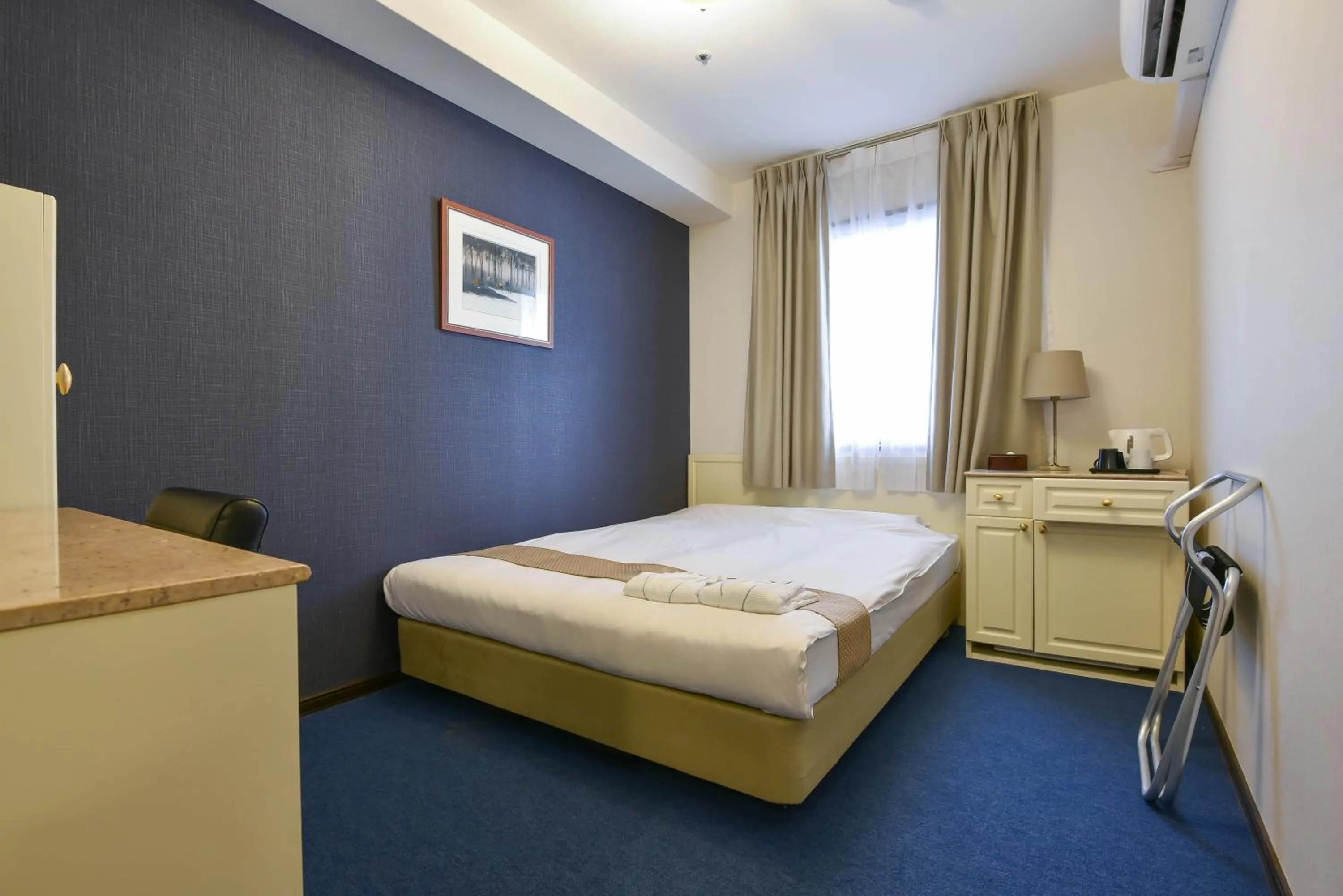 Bed in New Osaka Hotel Shinsaibashi