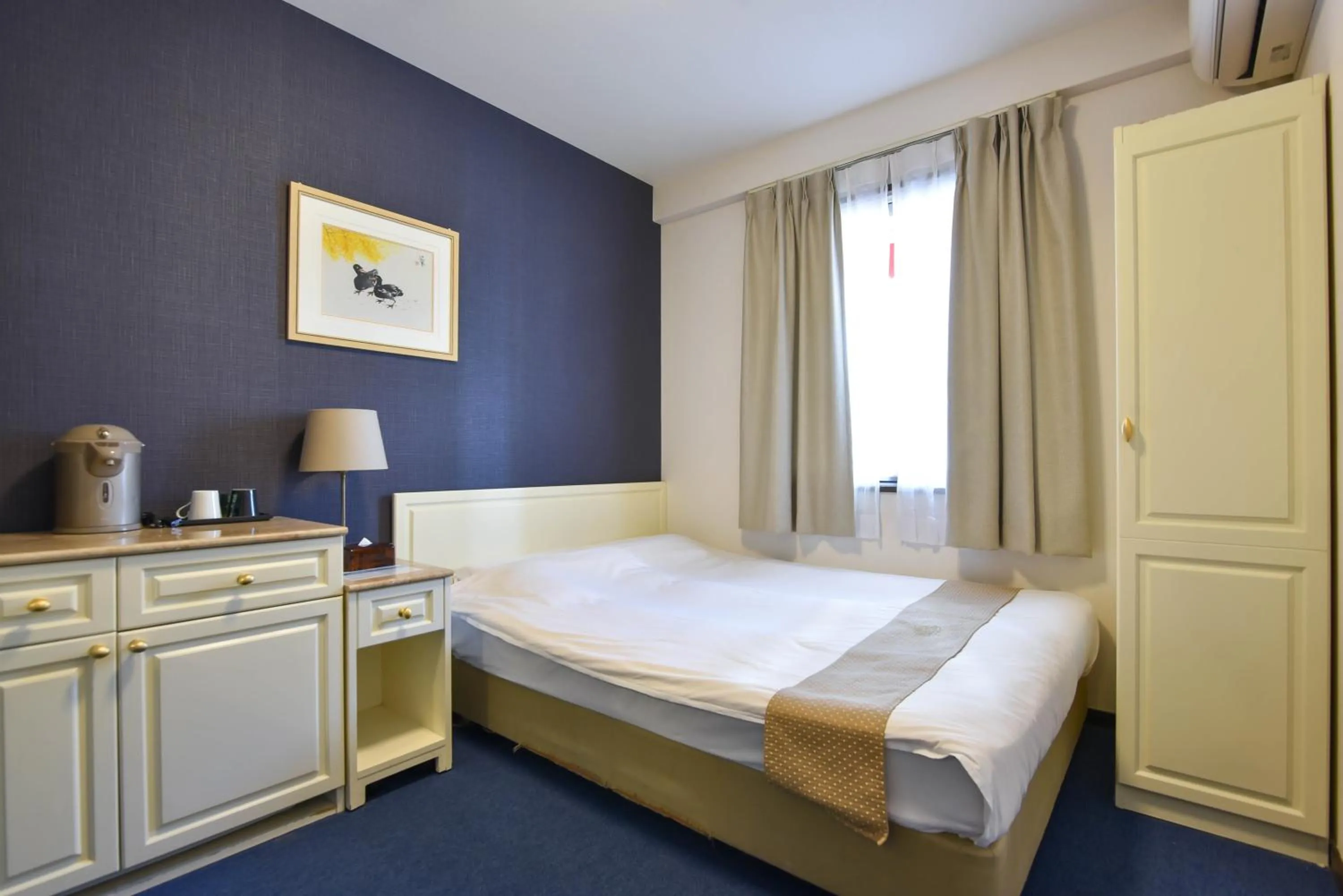 Bed in New Osaka Hotel Shinsaibashi