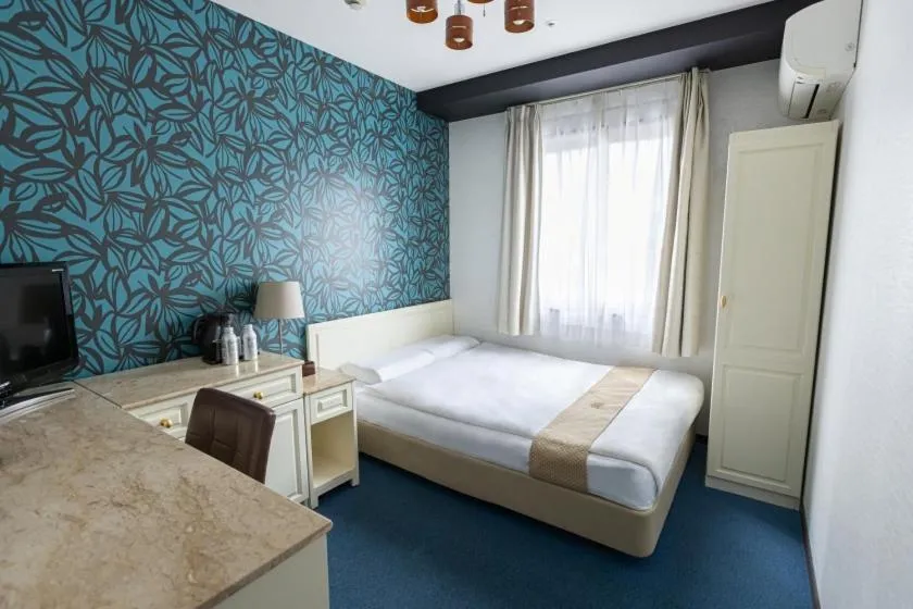 Bed in New Osaka Hotel Shinsaibashi