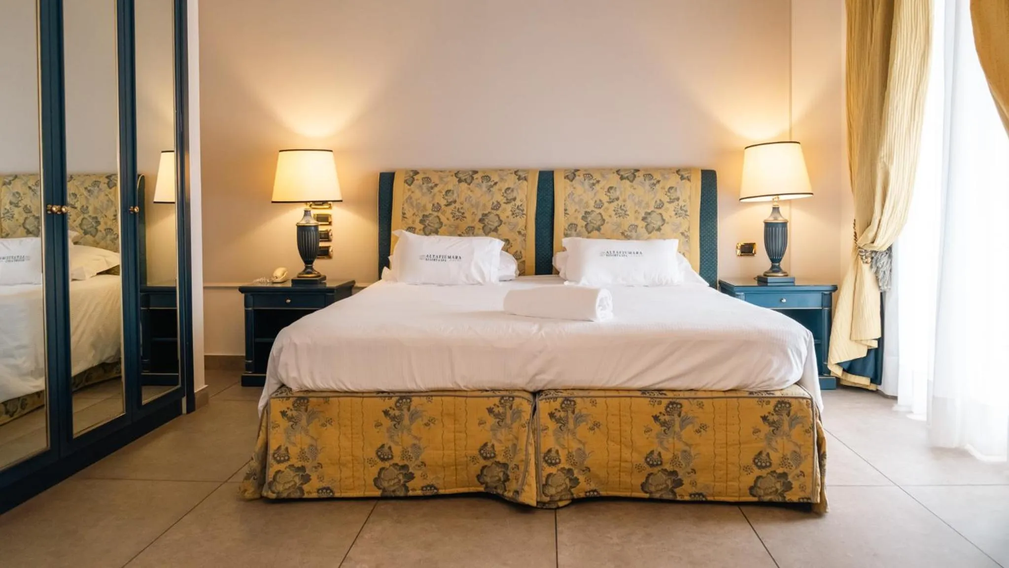 Bed in Altafiumara Resort & Spa