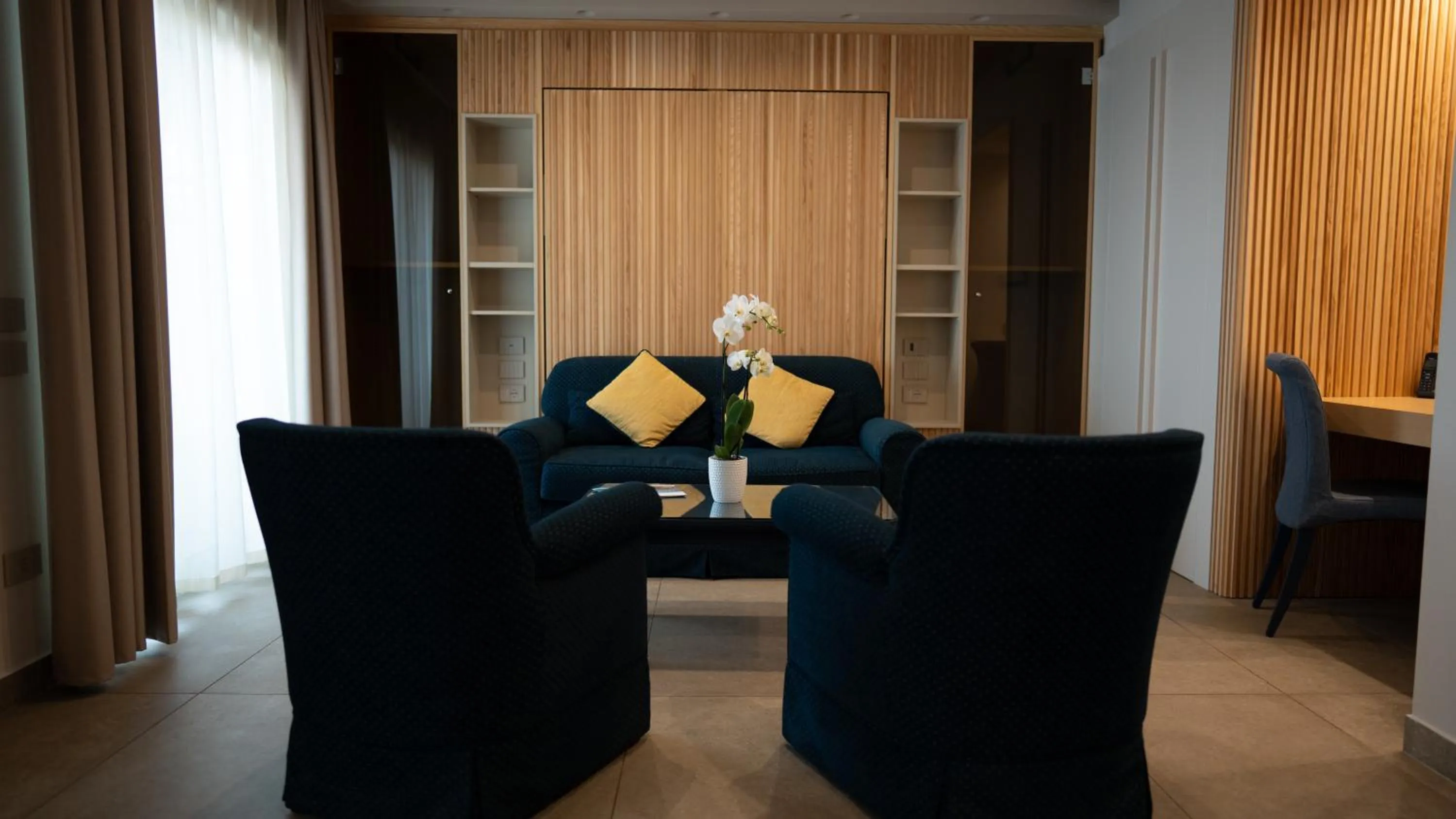 Living room in Altafiumara Resort & Spa