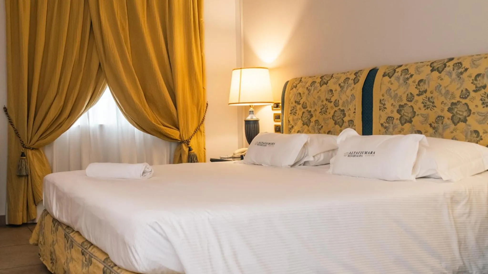 Bed in Altafiumara Resort & Spa