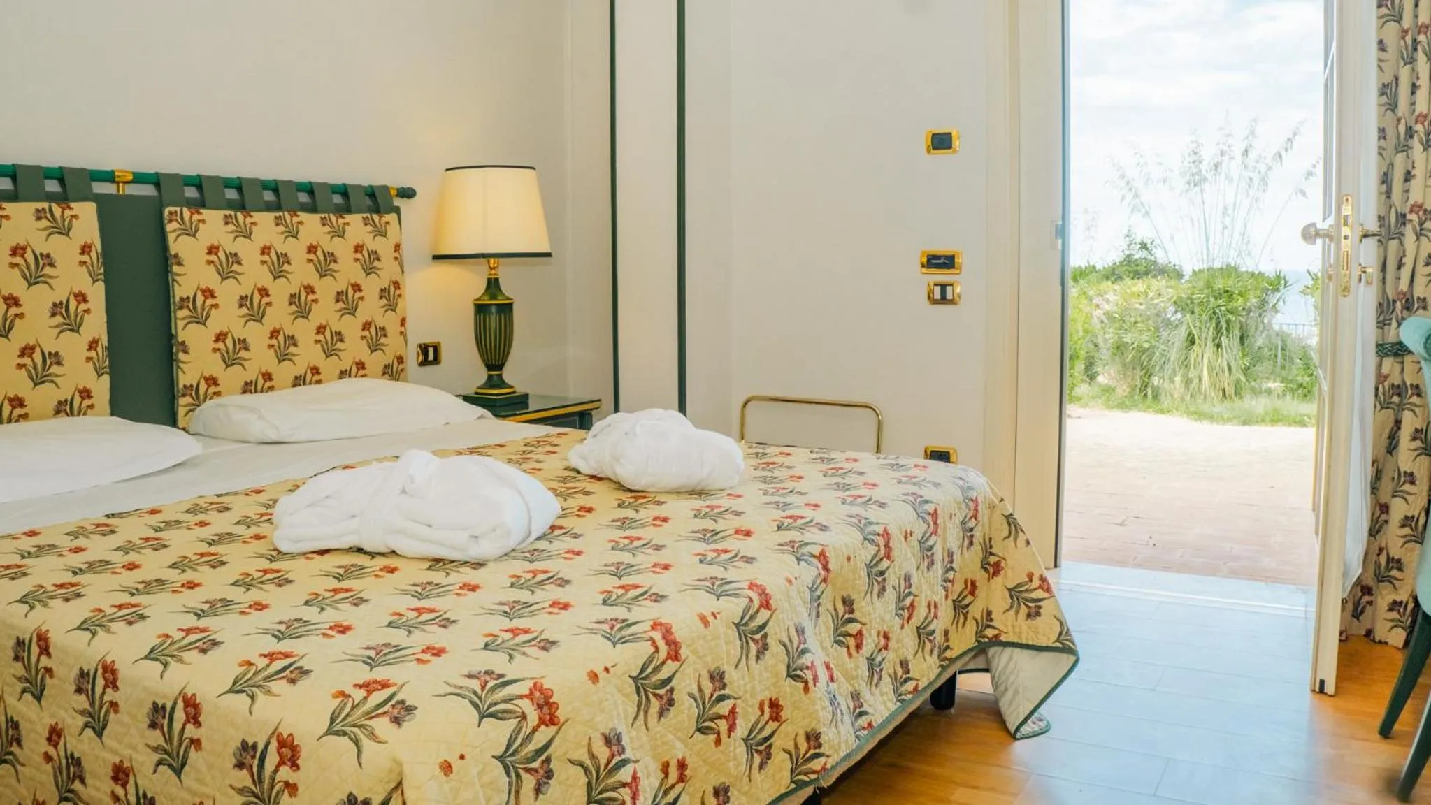 Bed in Altafiumara Resort & Spa