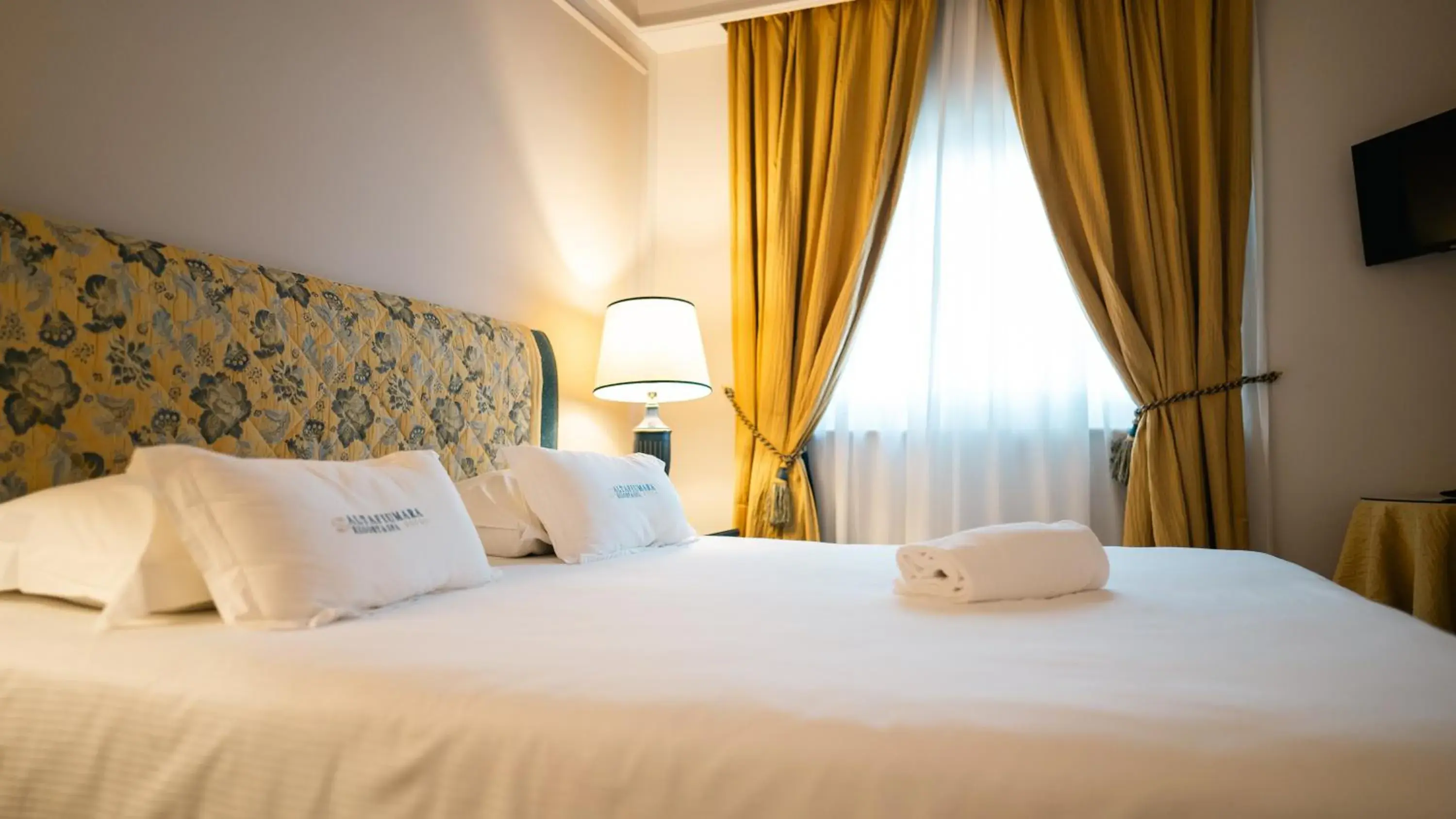 Bed in Altafiumara Resort & Spa Bed in Altafiumara Resort & Spa