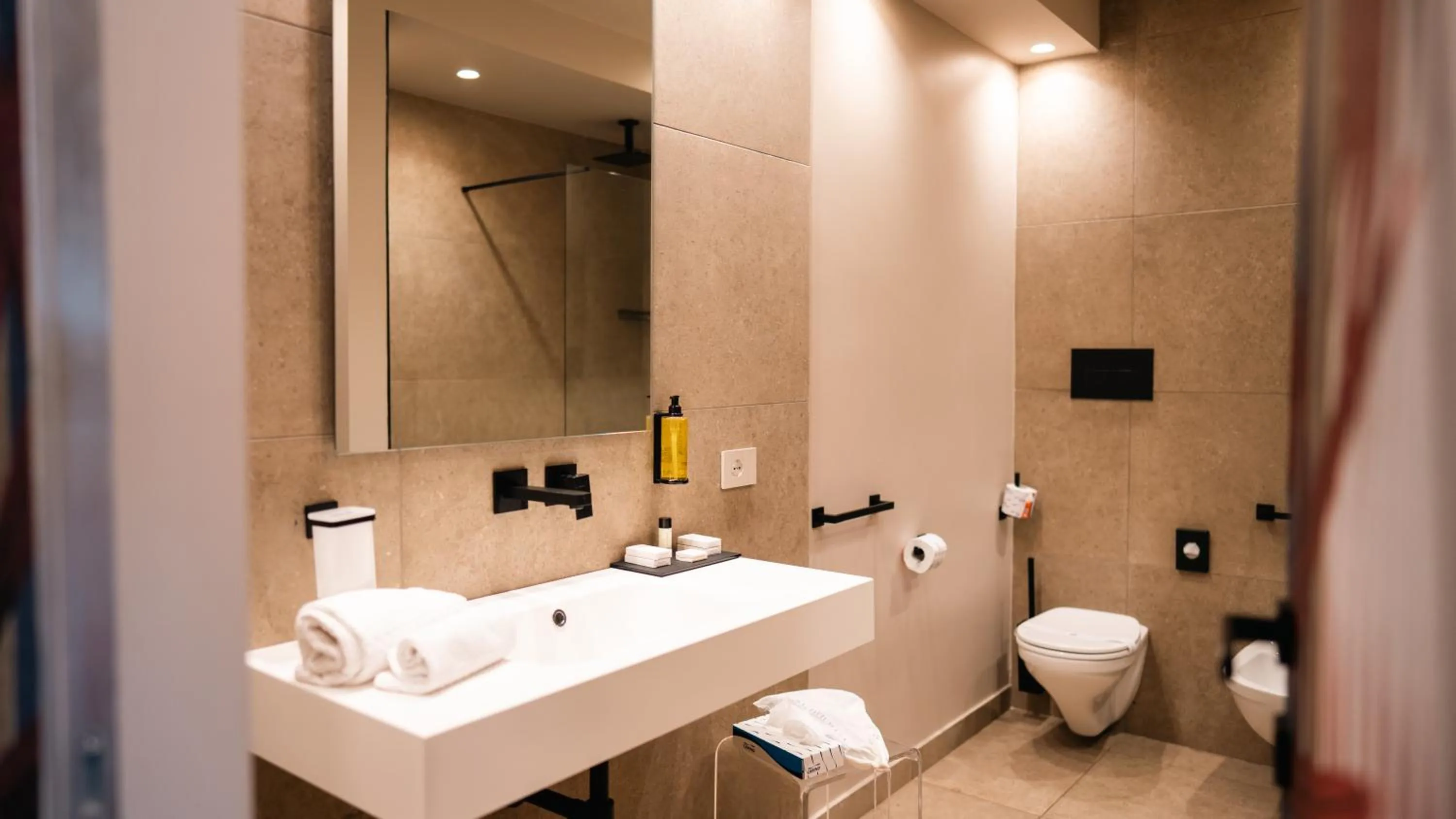 Shower in Altafiumara Resort & Spa