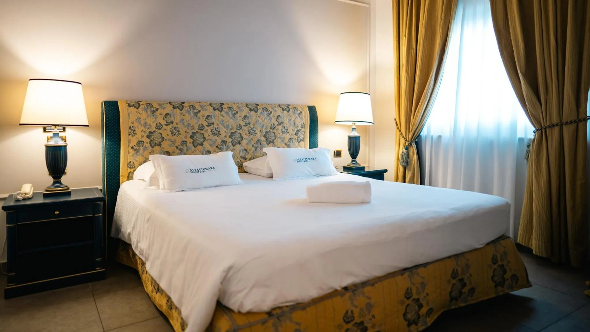 Bed in Altafiumara Resort & Spa