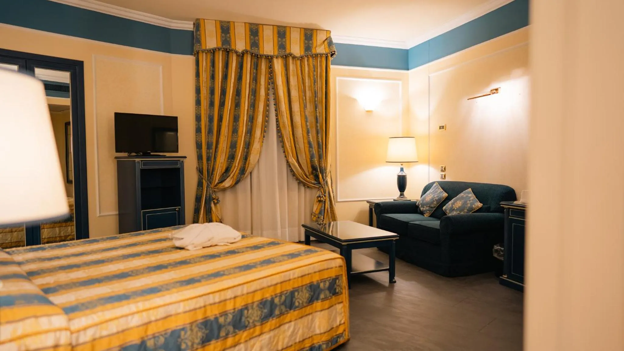 Bed in Altafiumara Resort & Spa