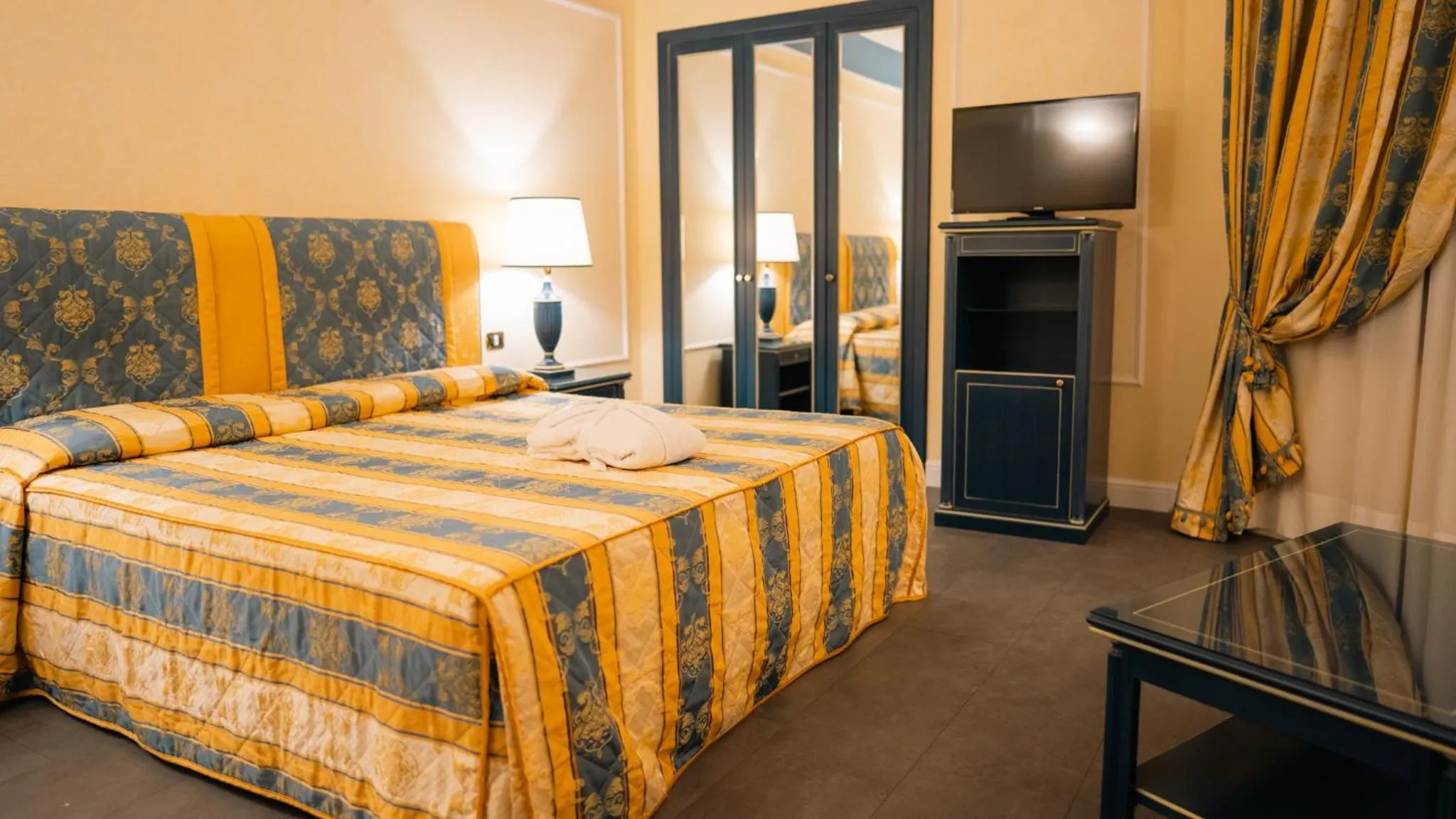 Bed in Altafiumara Resort & Spa