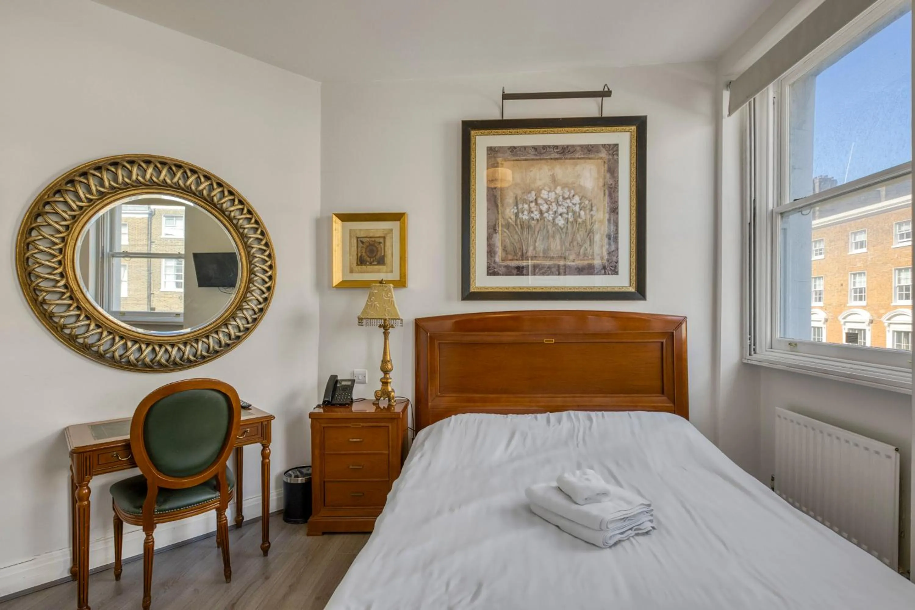 Bed in Opulence Boutique Hotel