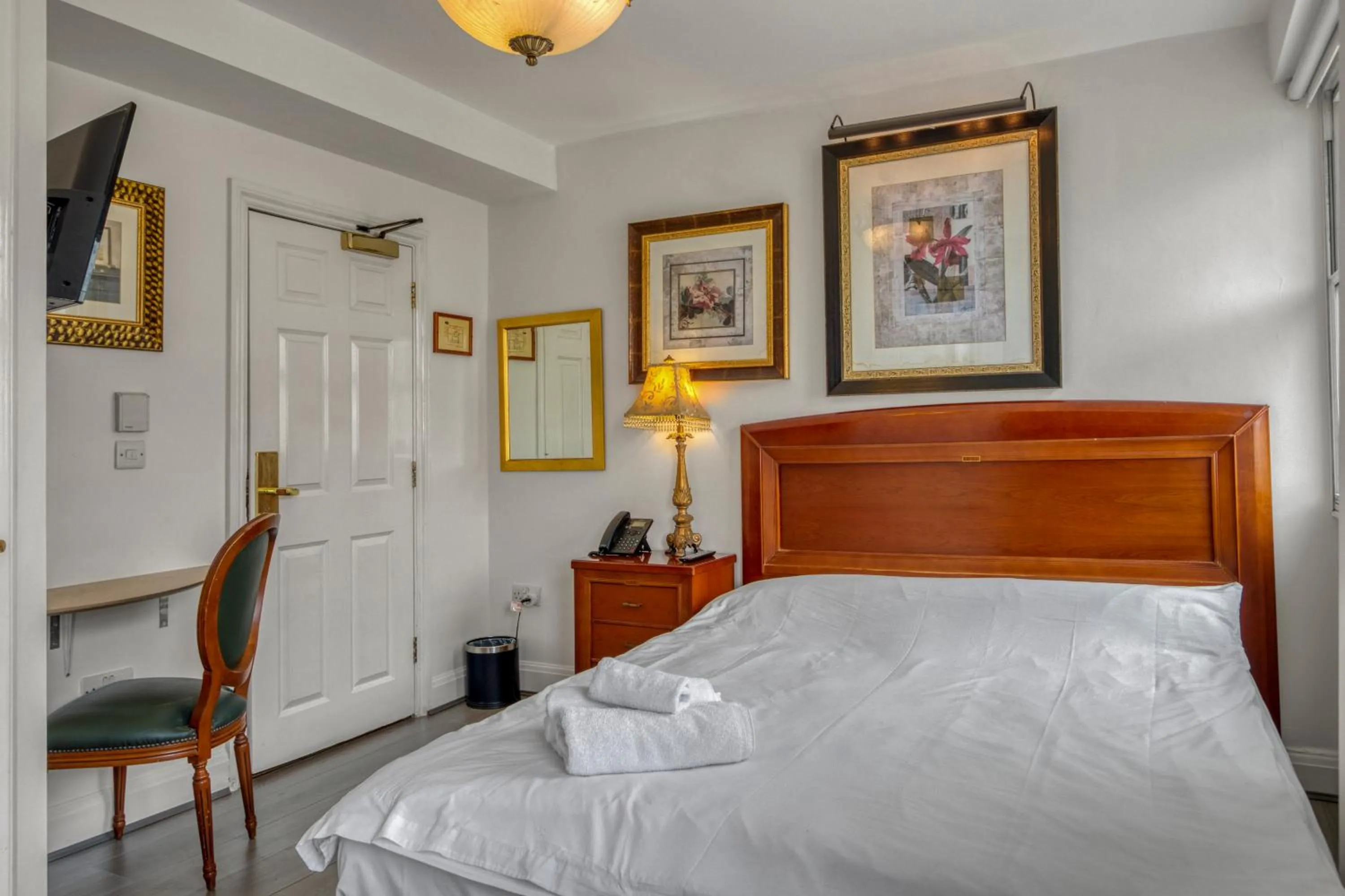 Bed in Opulence Boutique Hotel