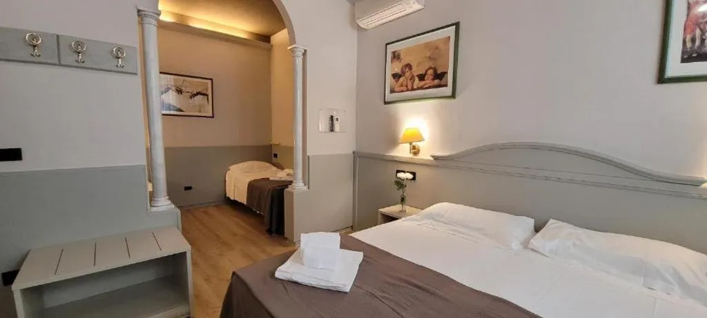 Bed in Hotel Camilla Guelfa