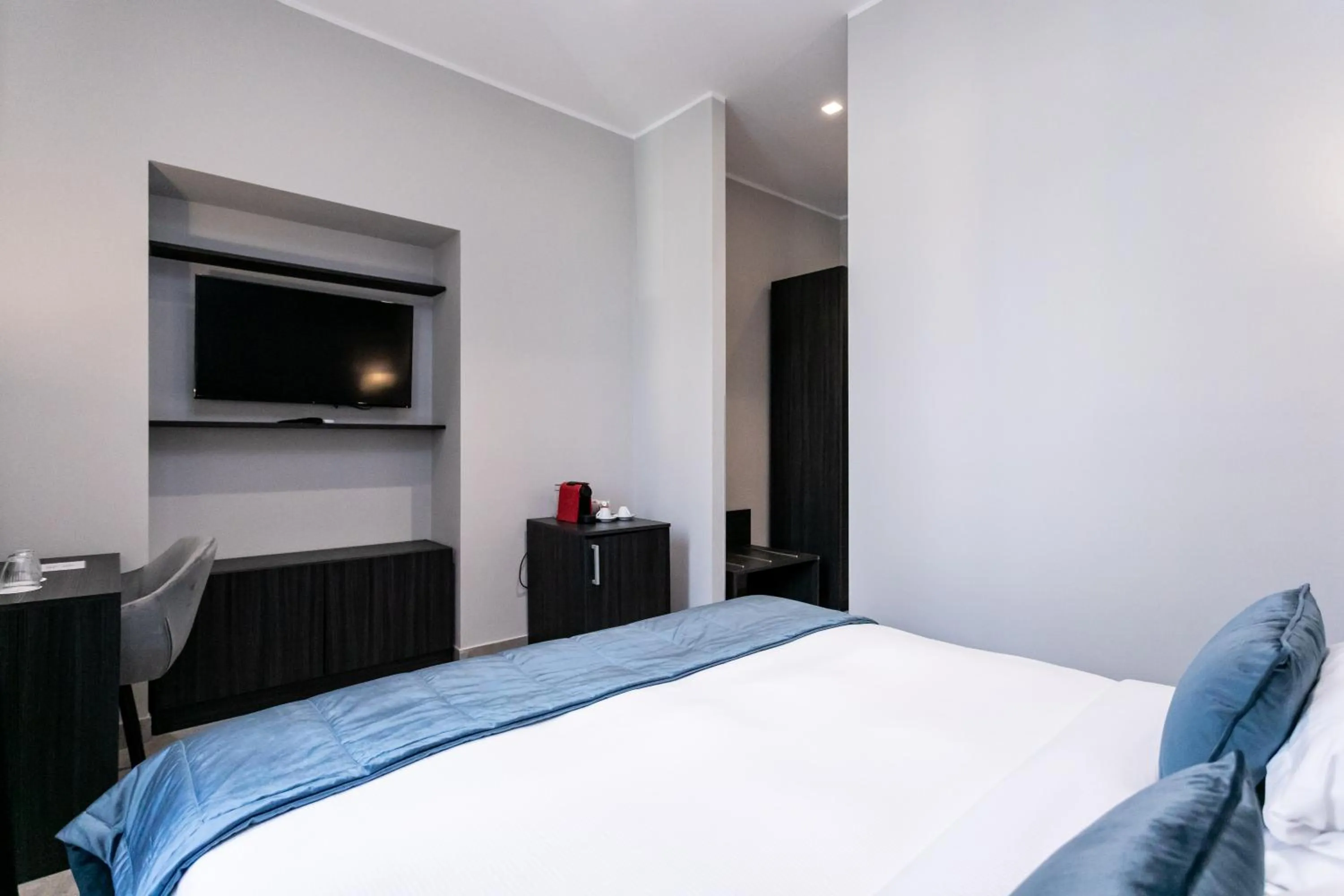 Bed in Cesare ai Cavalieri Suites