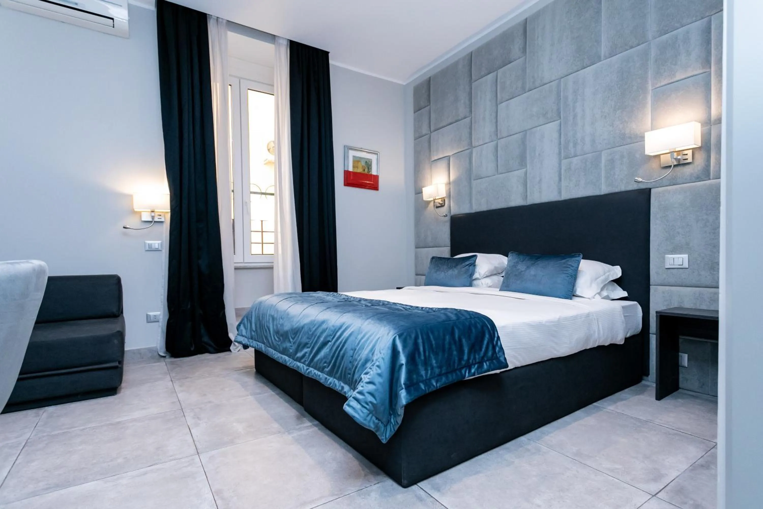 Bed in Cesare ai Cavalieri Suites