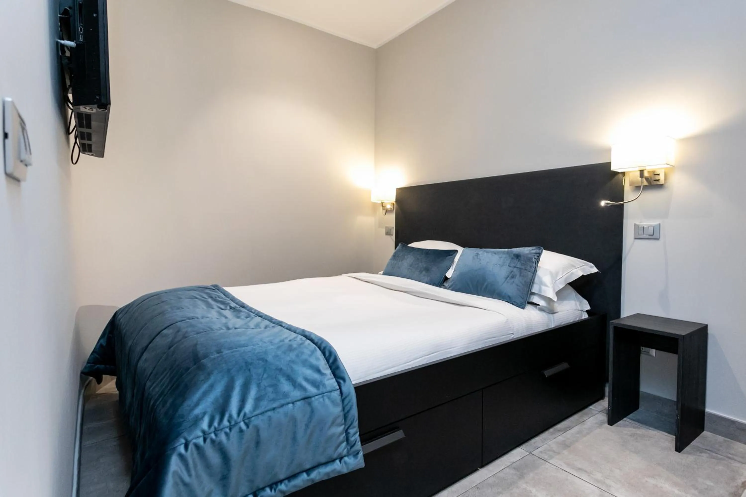 Bed in Cesare ai Cavalieri Suites