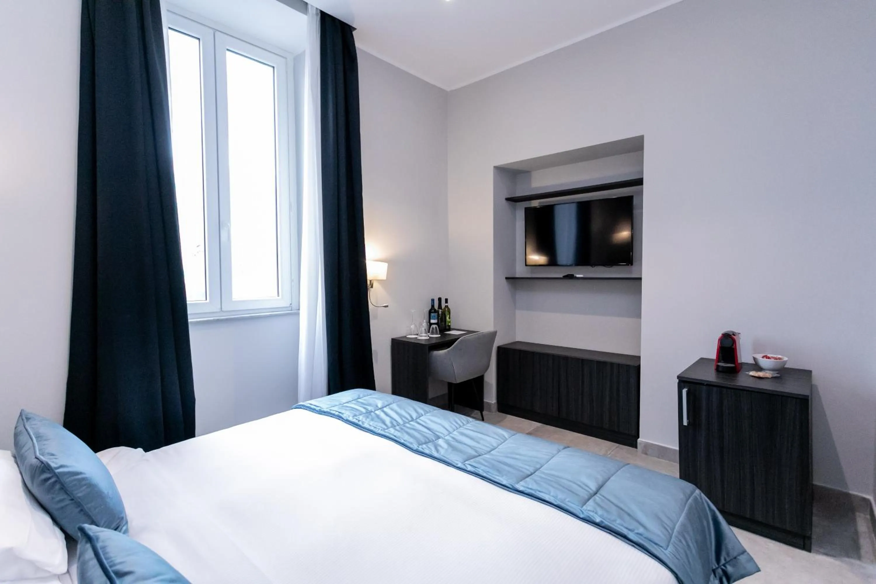 Bed in Cesare ai Cavalieri Suites