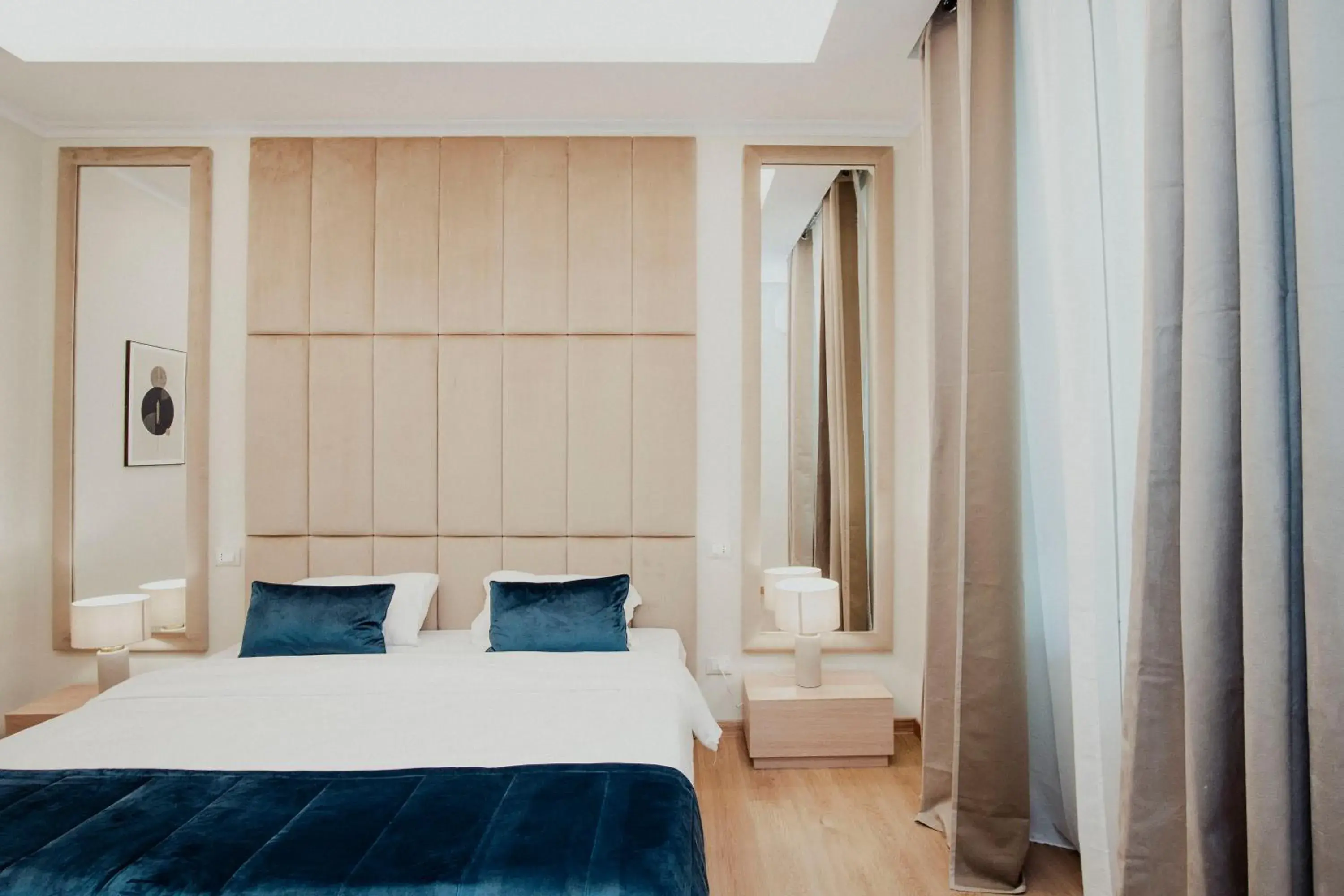 Bed in Cesare ai Cavalieri Suites Bed in Cesare ai Cavalieri Suites