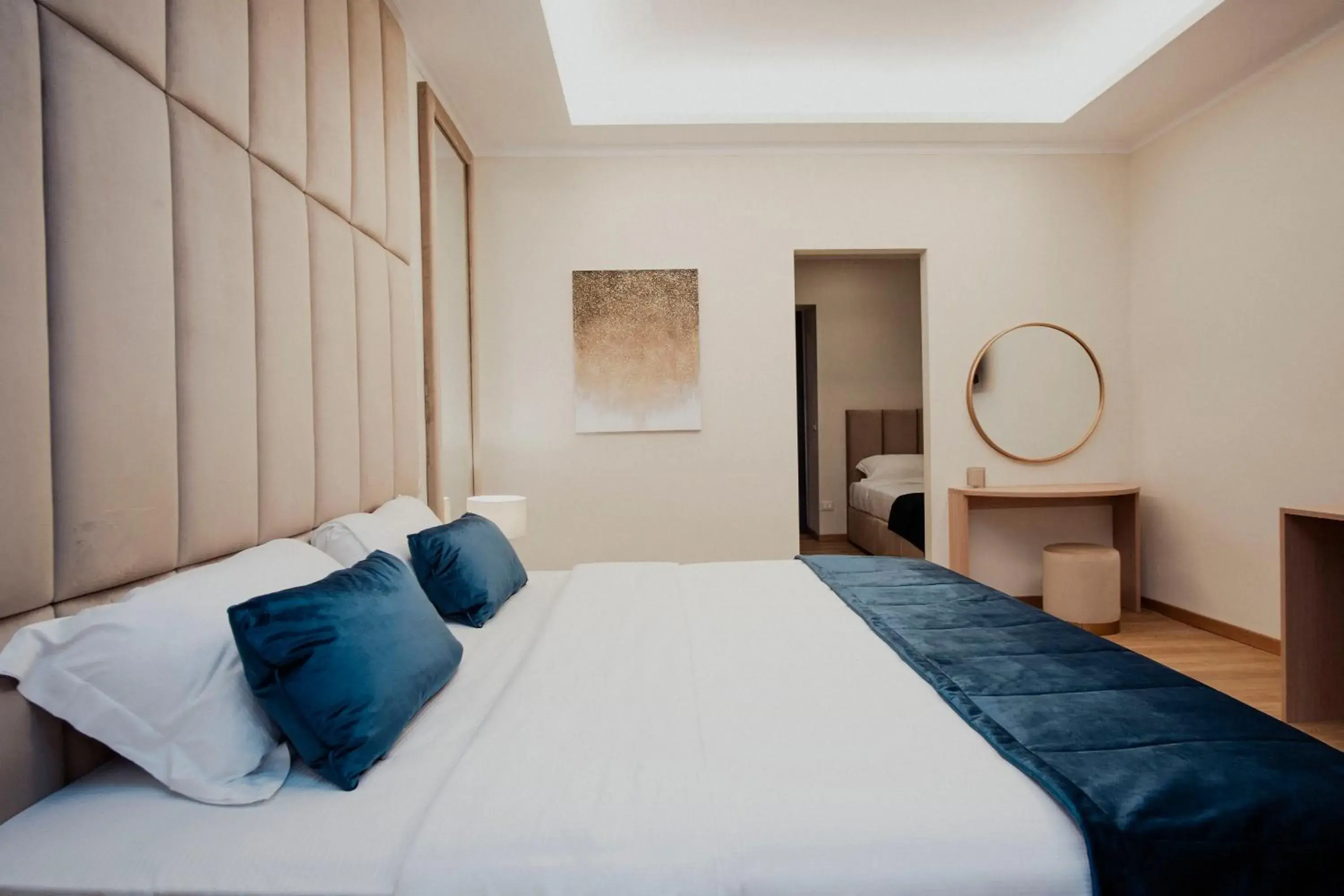 Bed in Cesare ai Cavalieri Suites Bed in Cesare ai Cavalieri Suites