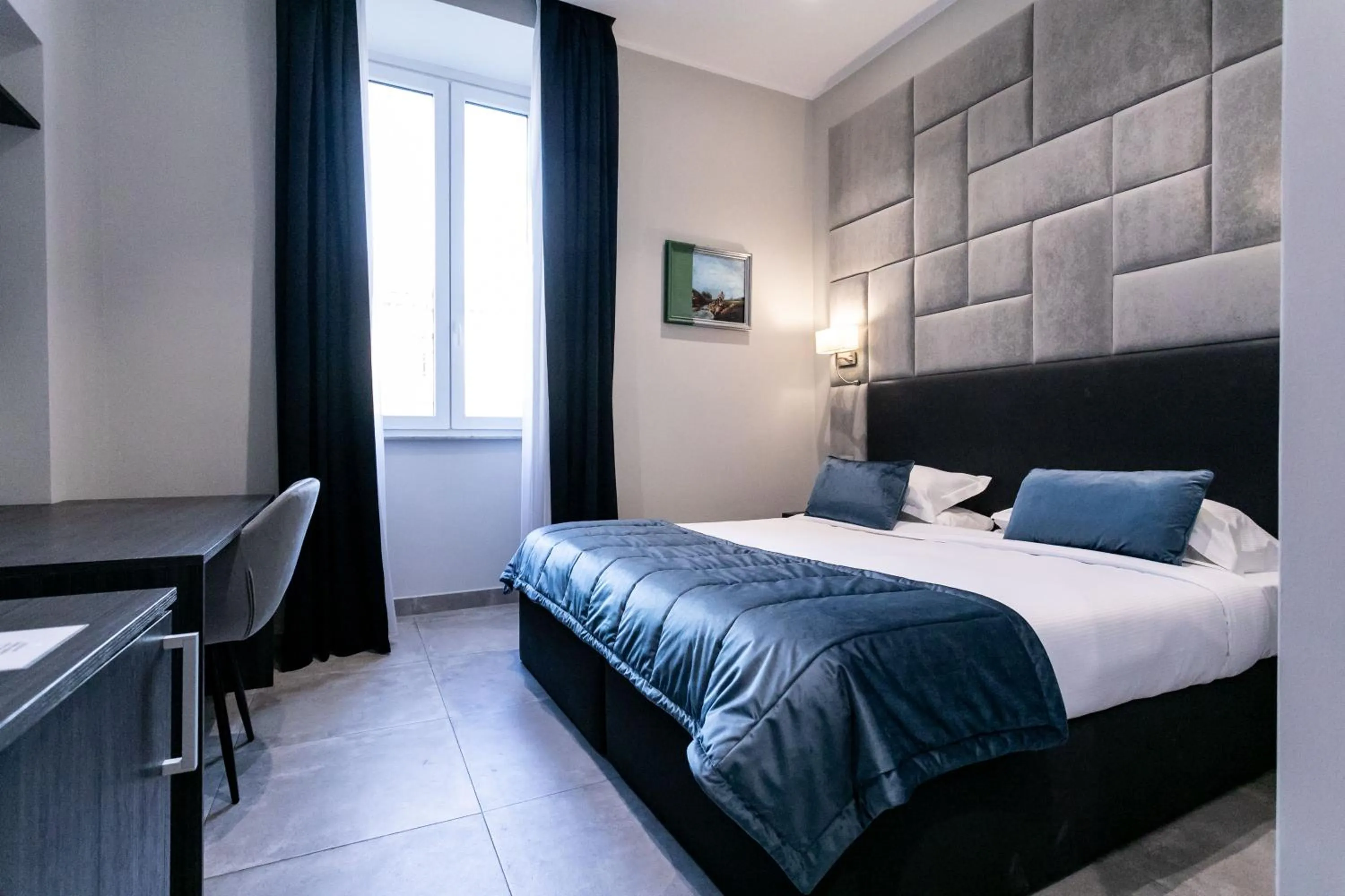 Bed in Cesare ai Cavalieri Suites