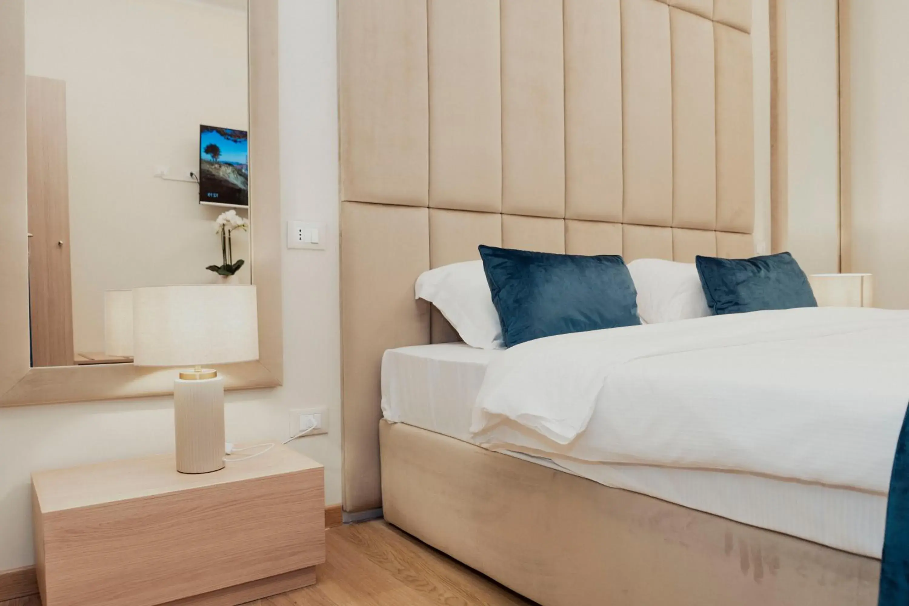 Bed in Cesare ai Cavalieri Suites Bed in Cesare ai Cavalieri Suites