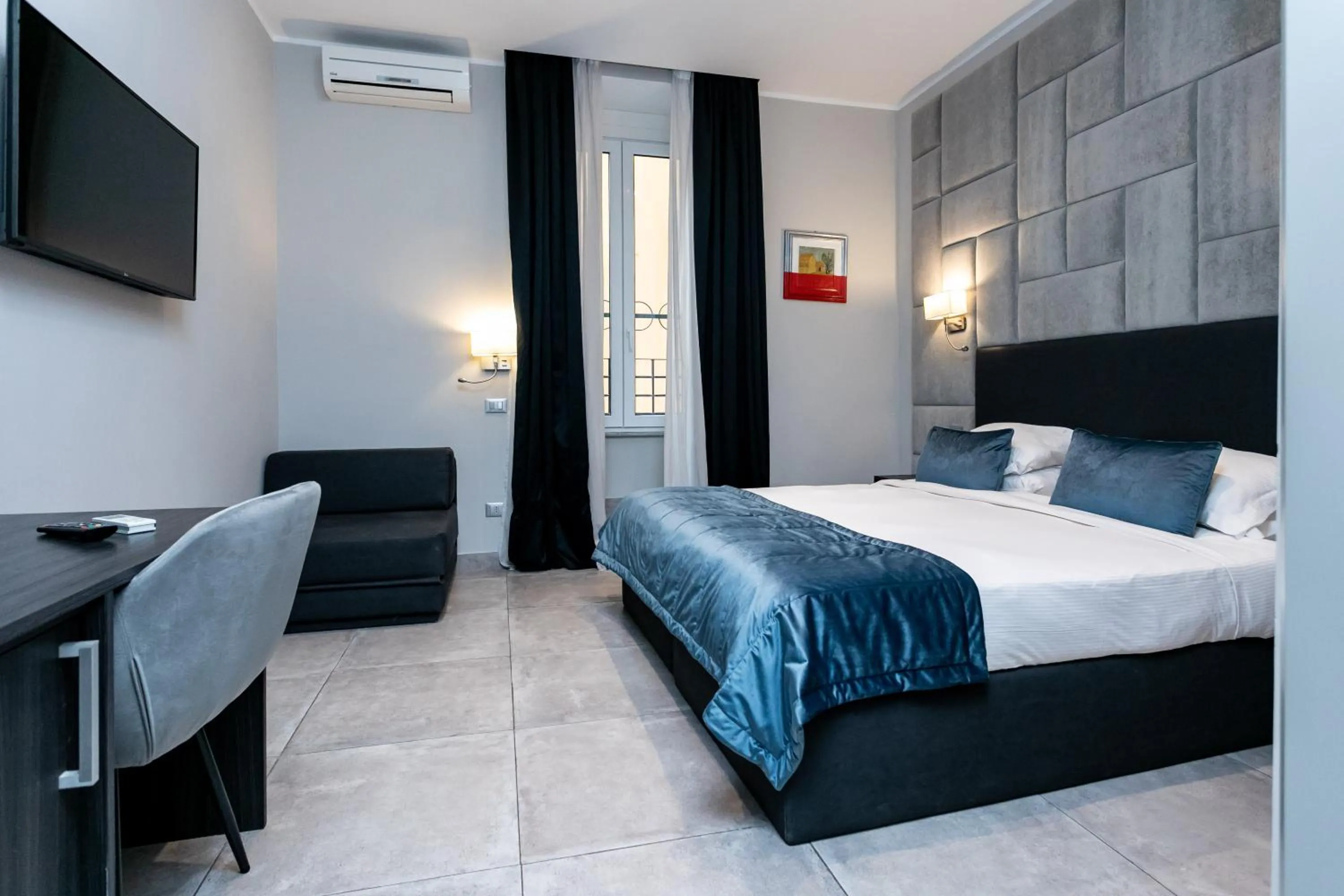 Bed in Cesare ai Cavalieri Suites