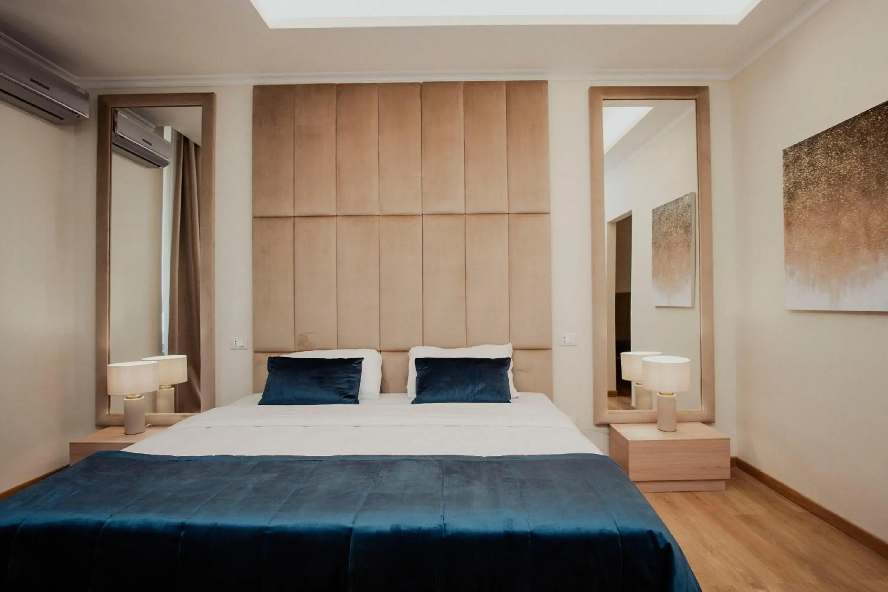 Bed in Cesare ai Cavalieri Suites Bed in Cesare ai Cavalieri Suites