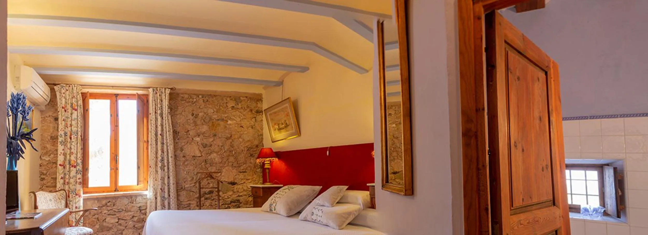 Photo of the whole room, Bed in Hotel Rural Mas Fontanelles