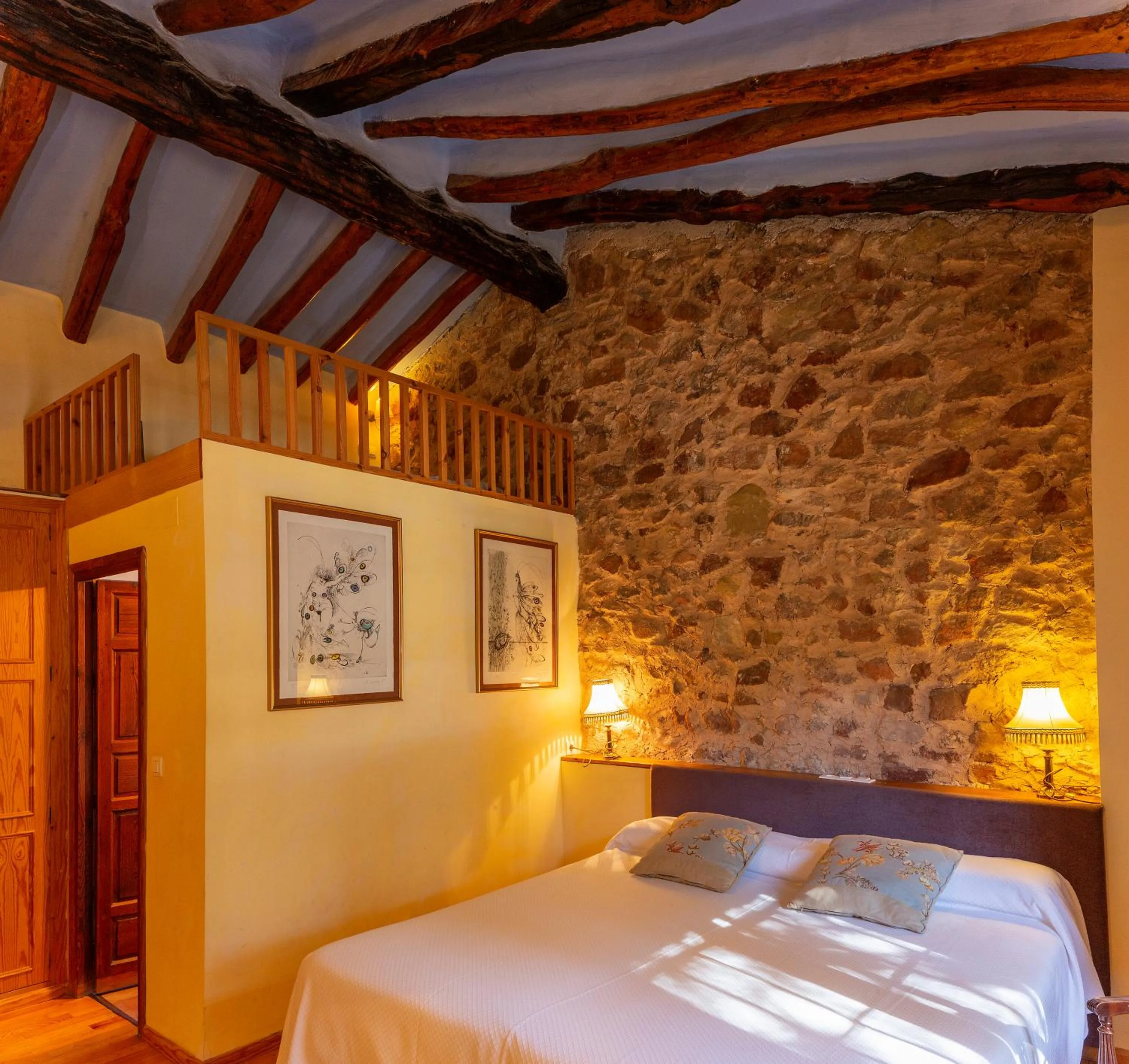 Photo of the whole room, Bed in Hotel Rural Mas Fontanelles