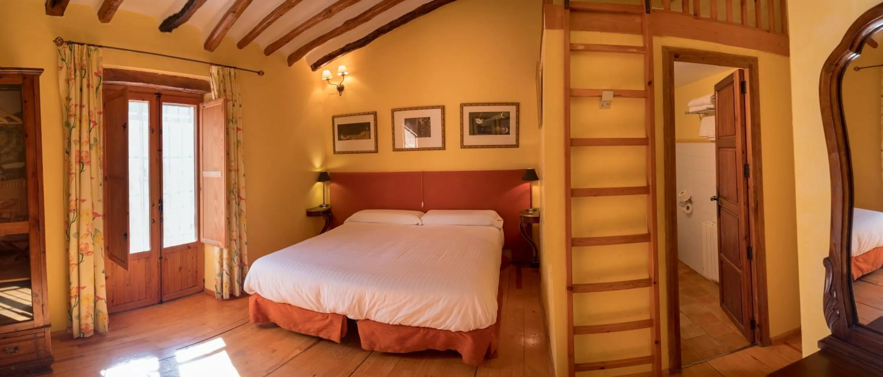 Photo of the whole room, Bed in Hotel Rural Mas Fontanelles