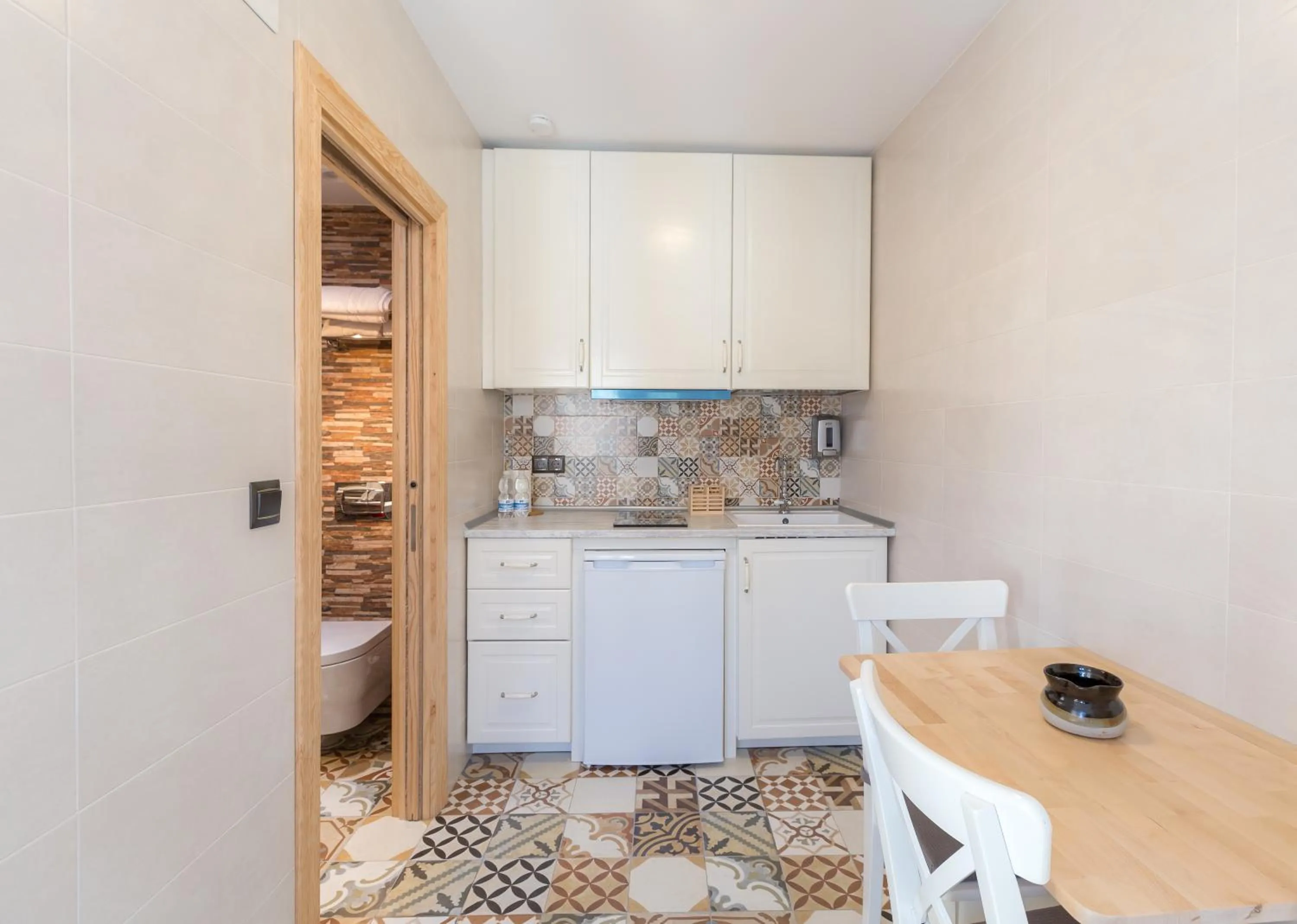 Kitchen or kitchenette in Salamandra Plaza