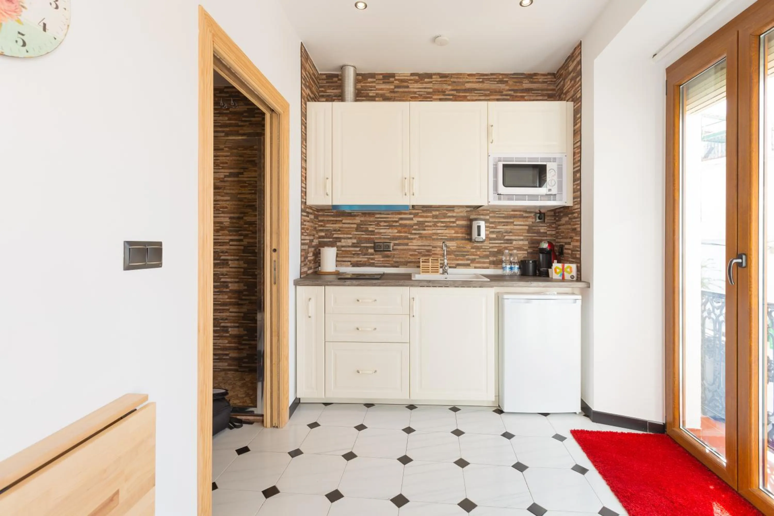 Kitchen or kitchenette in Salamandra Plaza