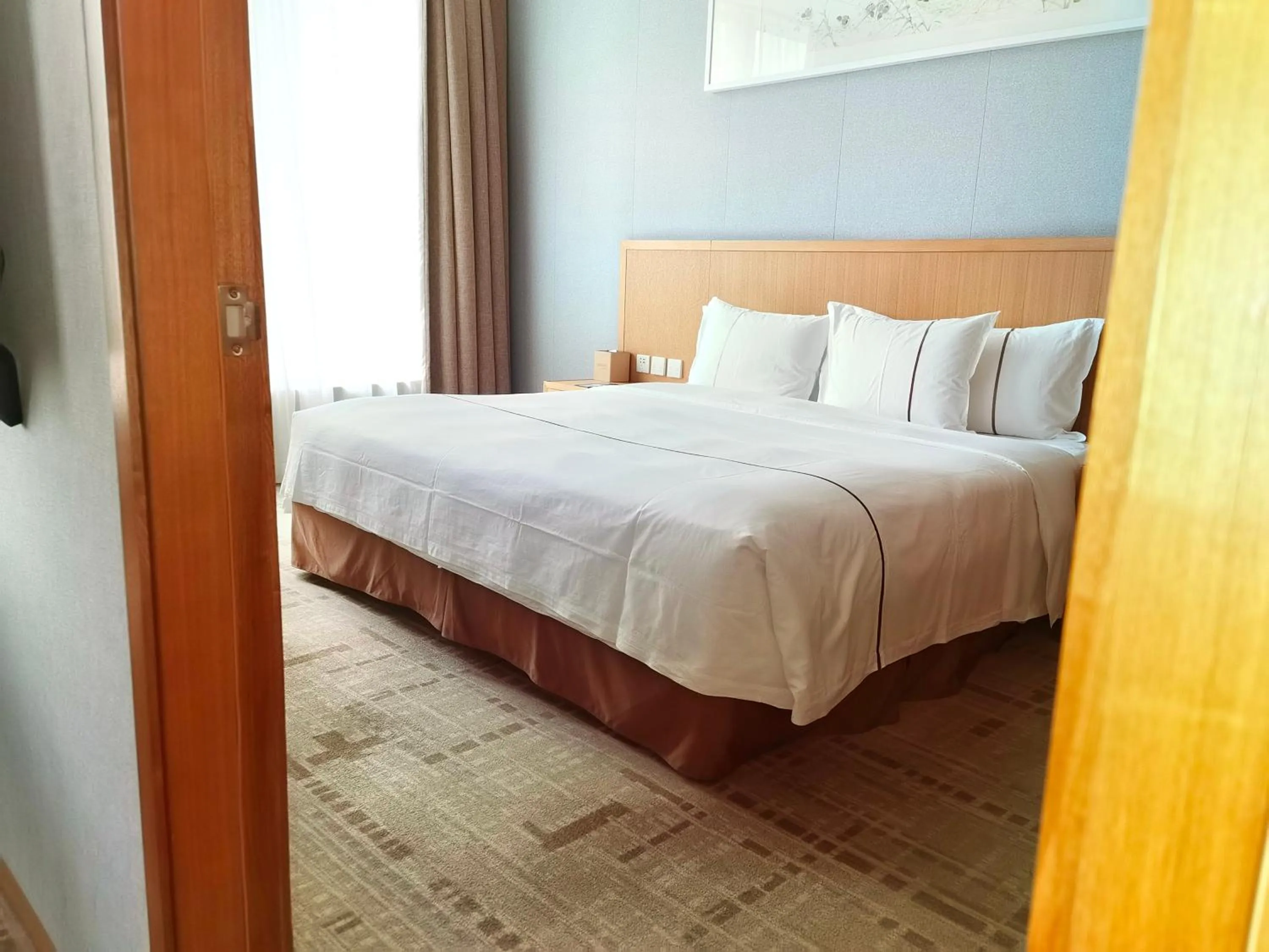 Bed in H' Elite Hotel