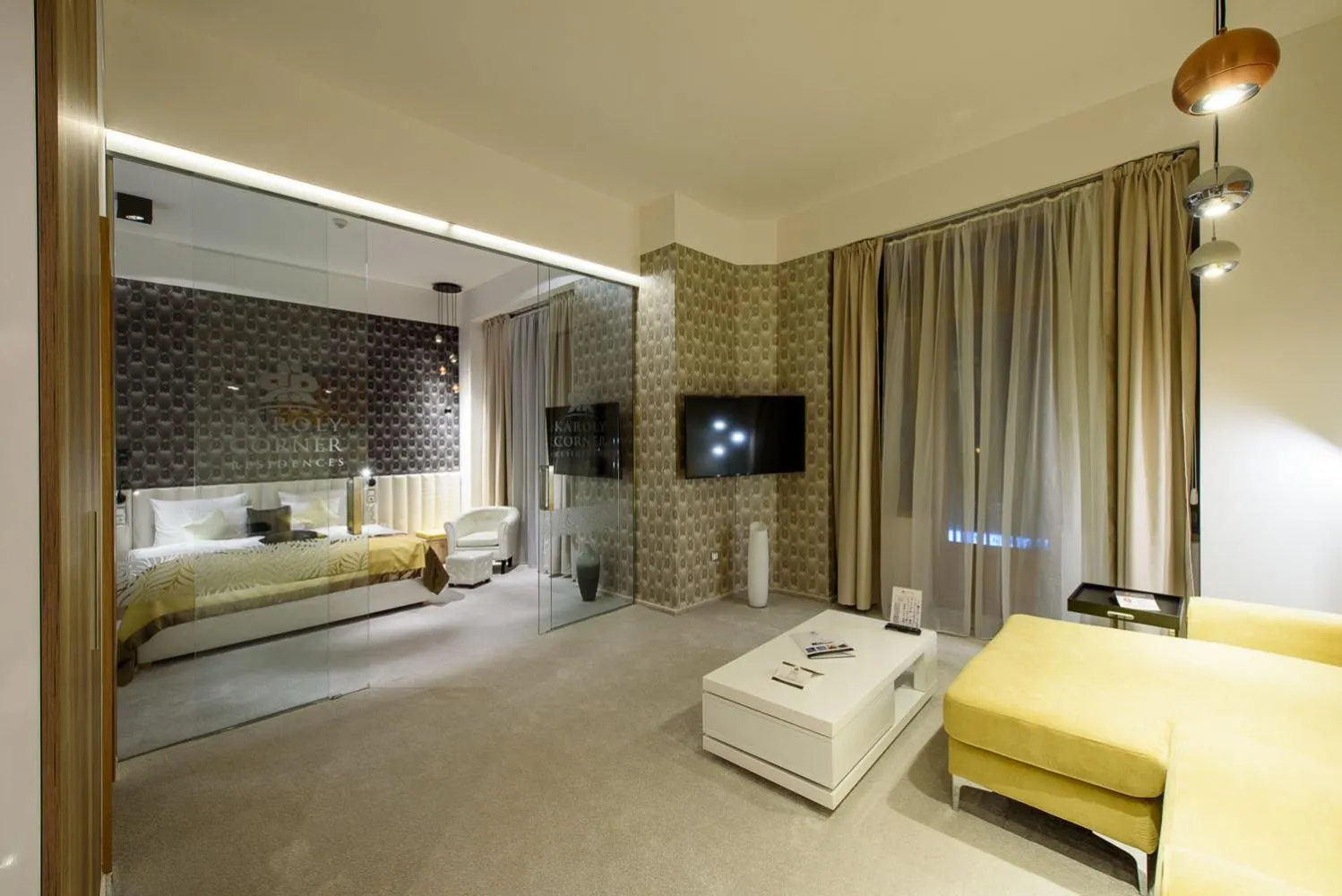 Living room, Bed in Karoly Corner Residences