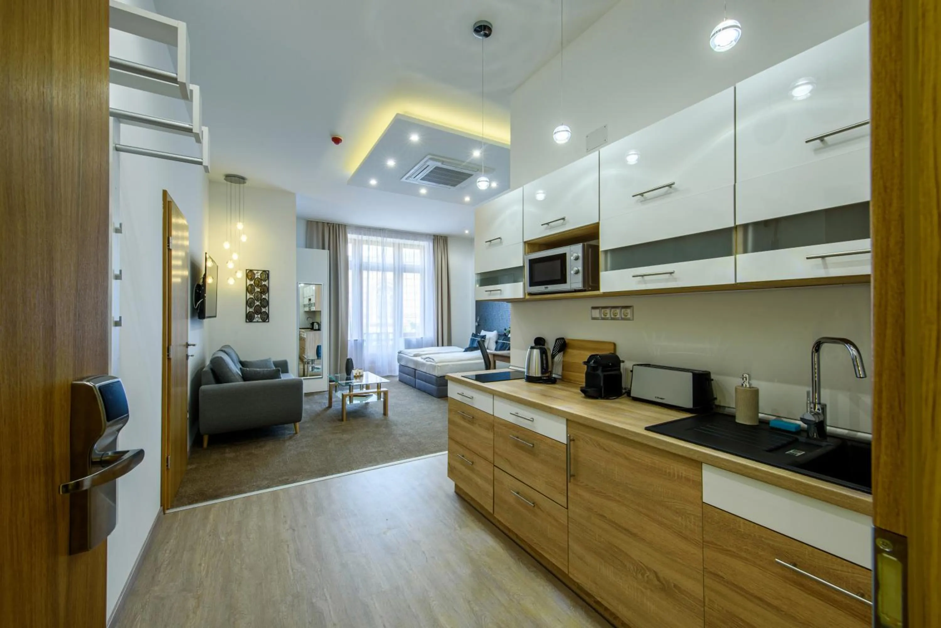 Kitchen or kitchenette in Karoly Corner Residences