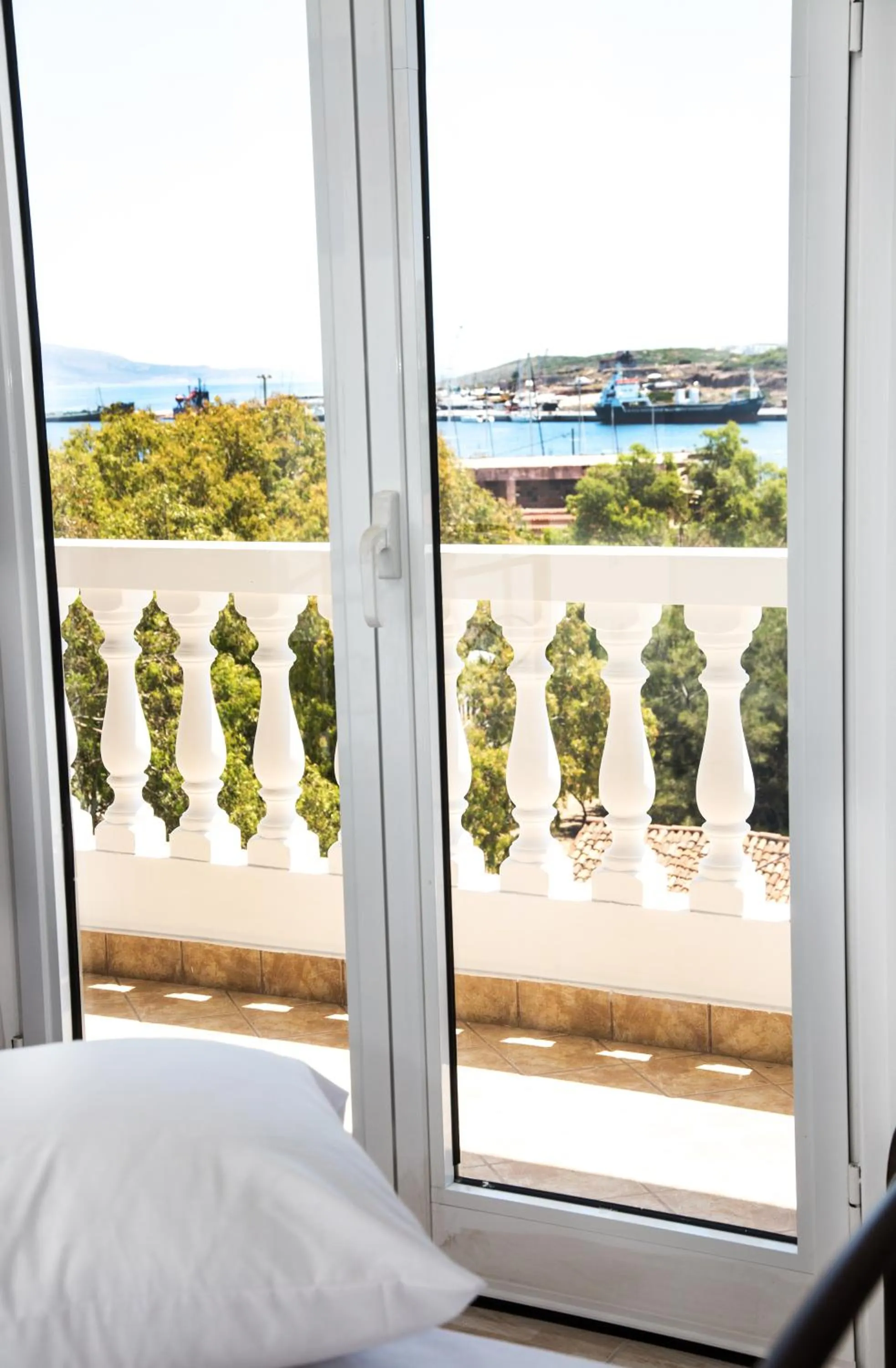 Bed in Nikolakakis Rooms Lavrio