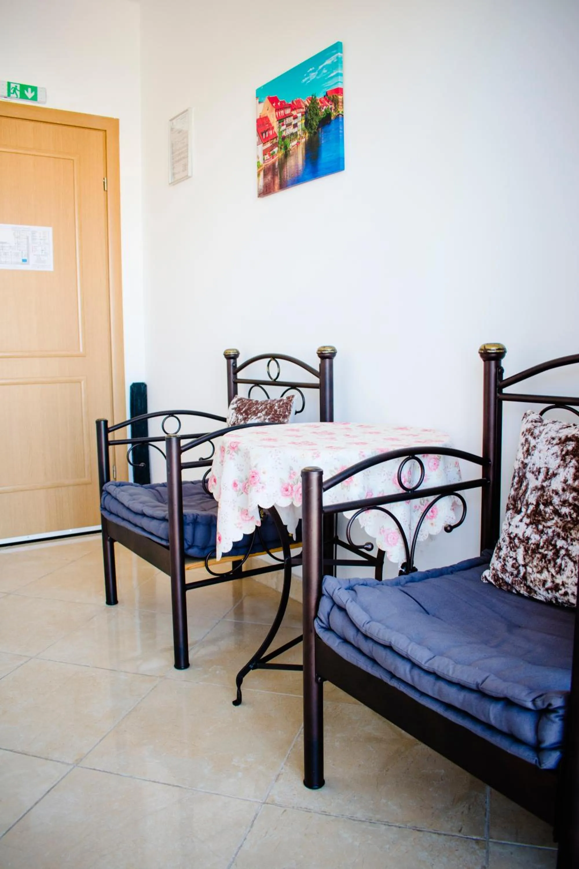 Bed in Nikolakakis Rooms Lavrio