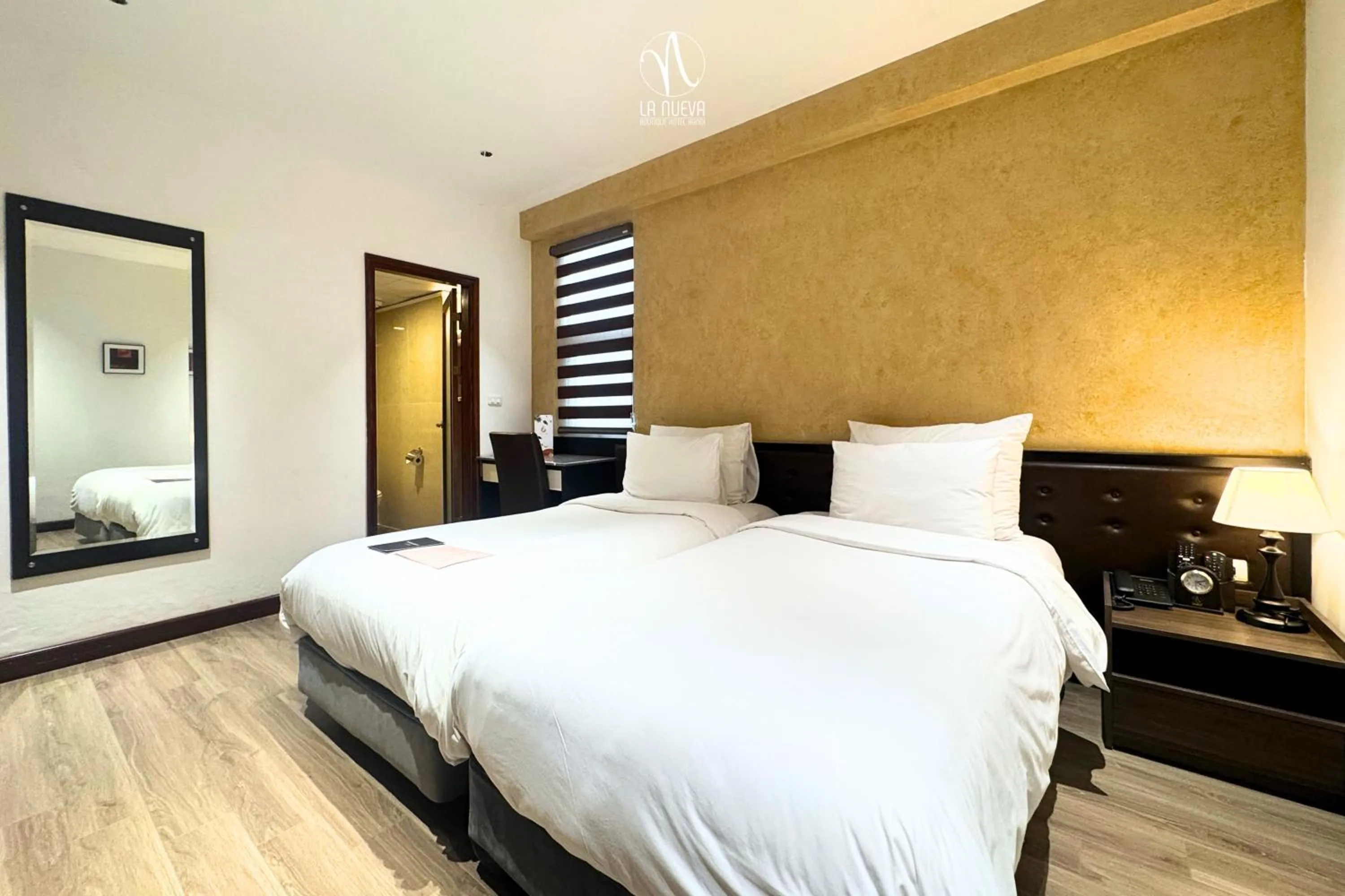 Photo of the whole room, Bed in La Nueva Boutique Hotel Hanoi & Spa