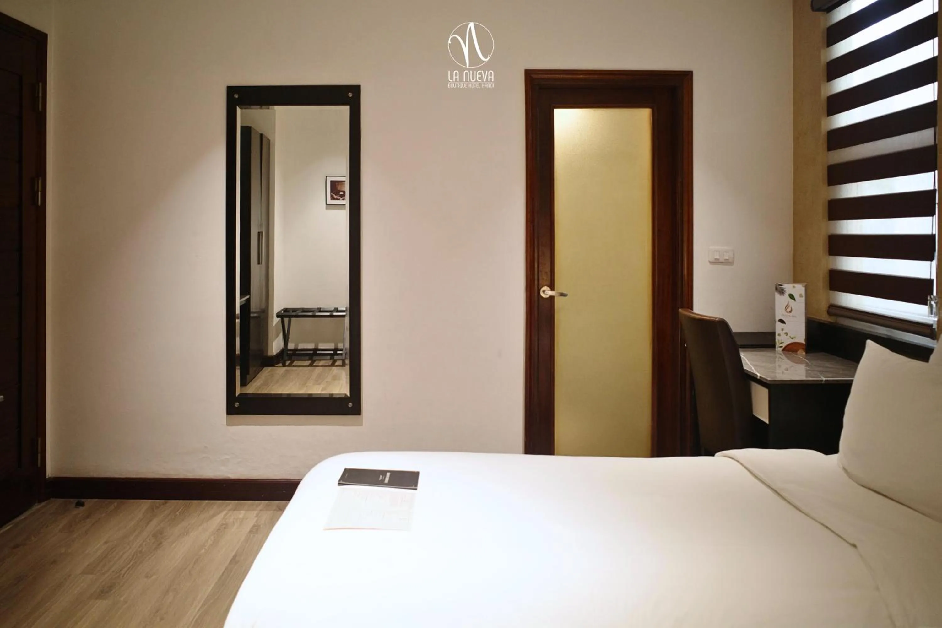 Photo of the whole room, Bed in La Nueva Boutique Hotel Hanoi & Spa