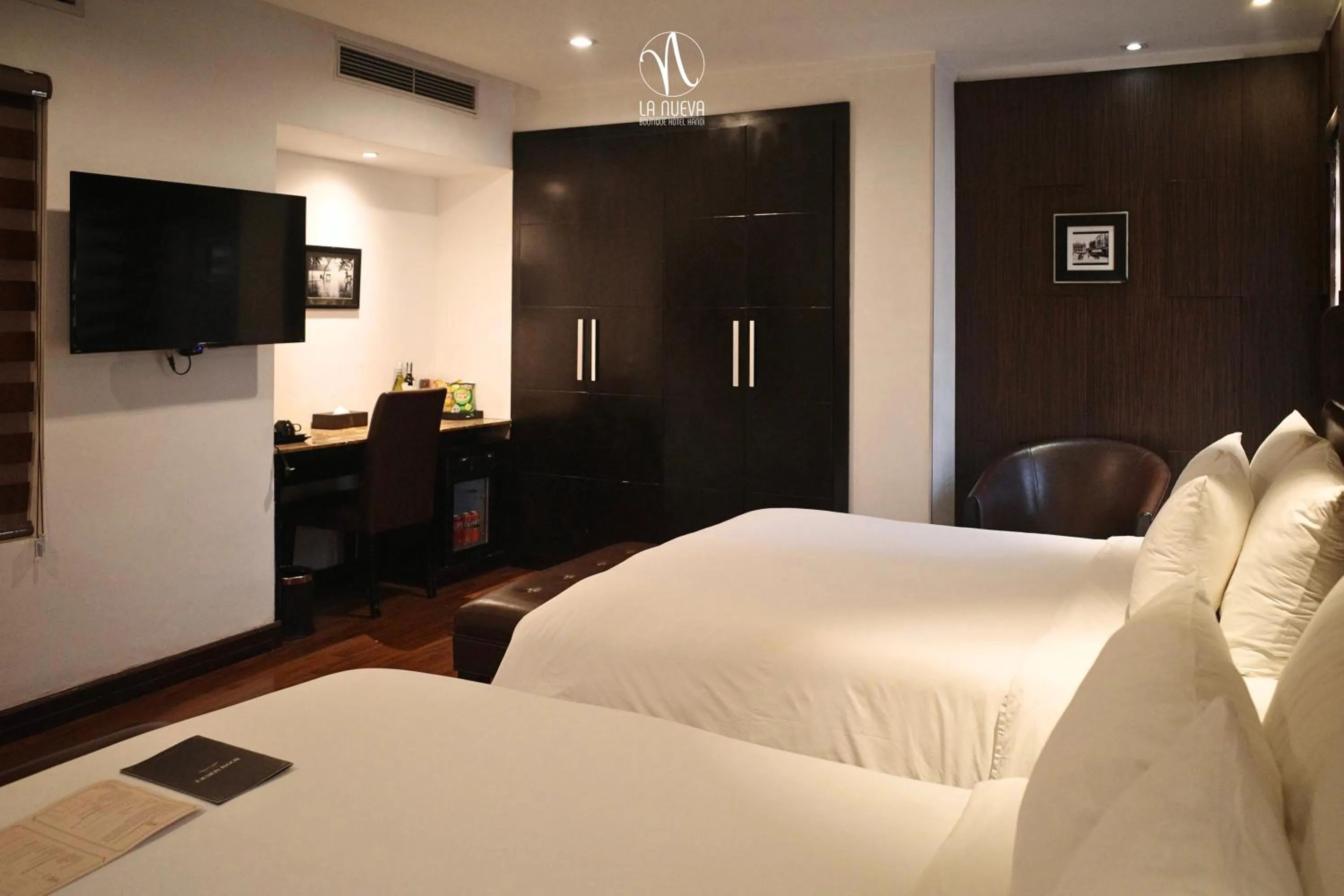 Photo of the whole room, Bed in La Nueva Boutique Hotel Hanoi & Spa