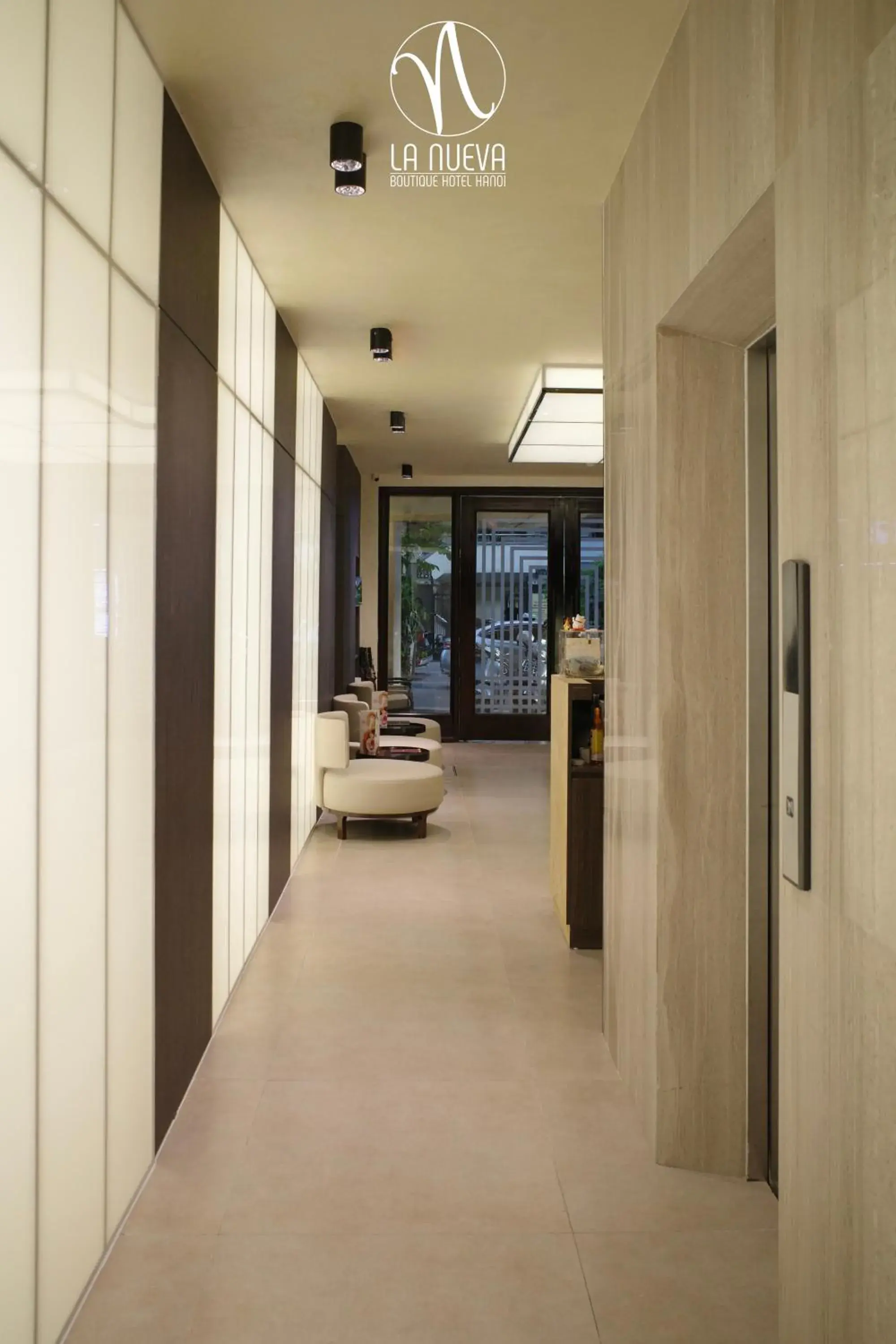 Communal lounge/ TV room, Bed in La Nueva Boutique Hotel Hanoi & Spa Communal lounge/ TV room, Bed in La Nueva Boutique Hotel Hanoi & Spa