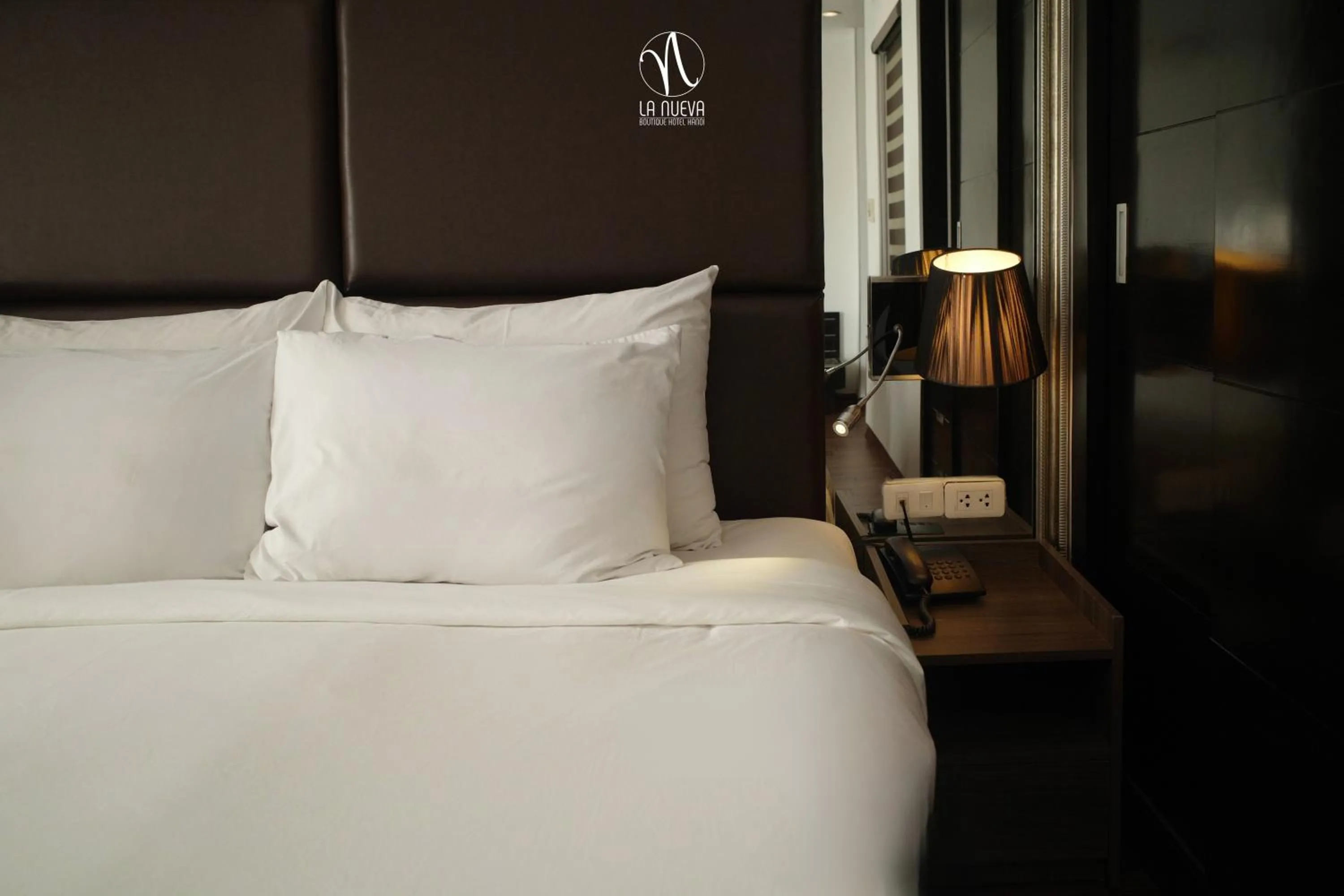 Bed in La Nueva Boutique Hotel Hanoi & Spa