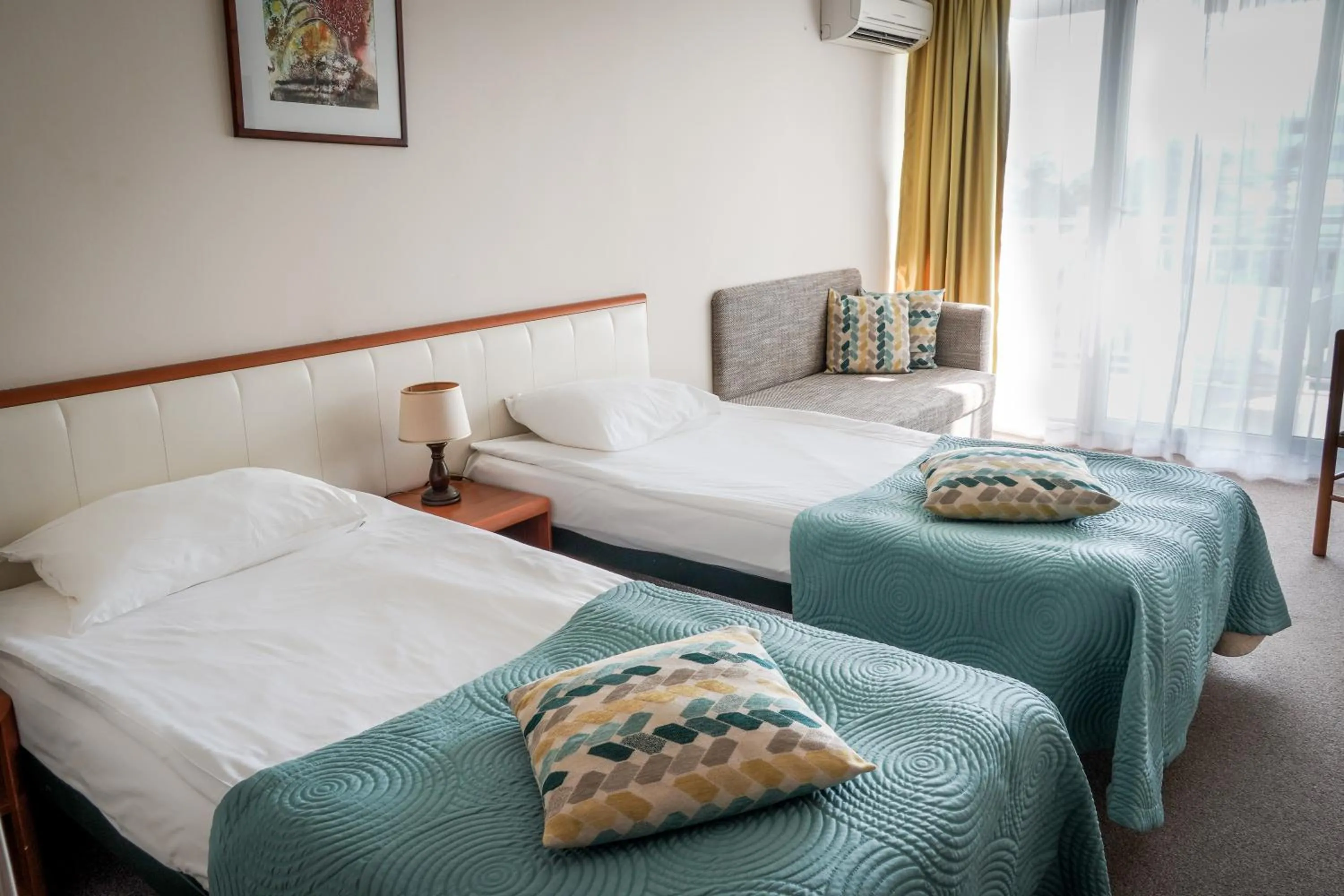 Bed in Hotel Laguna Garden