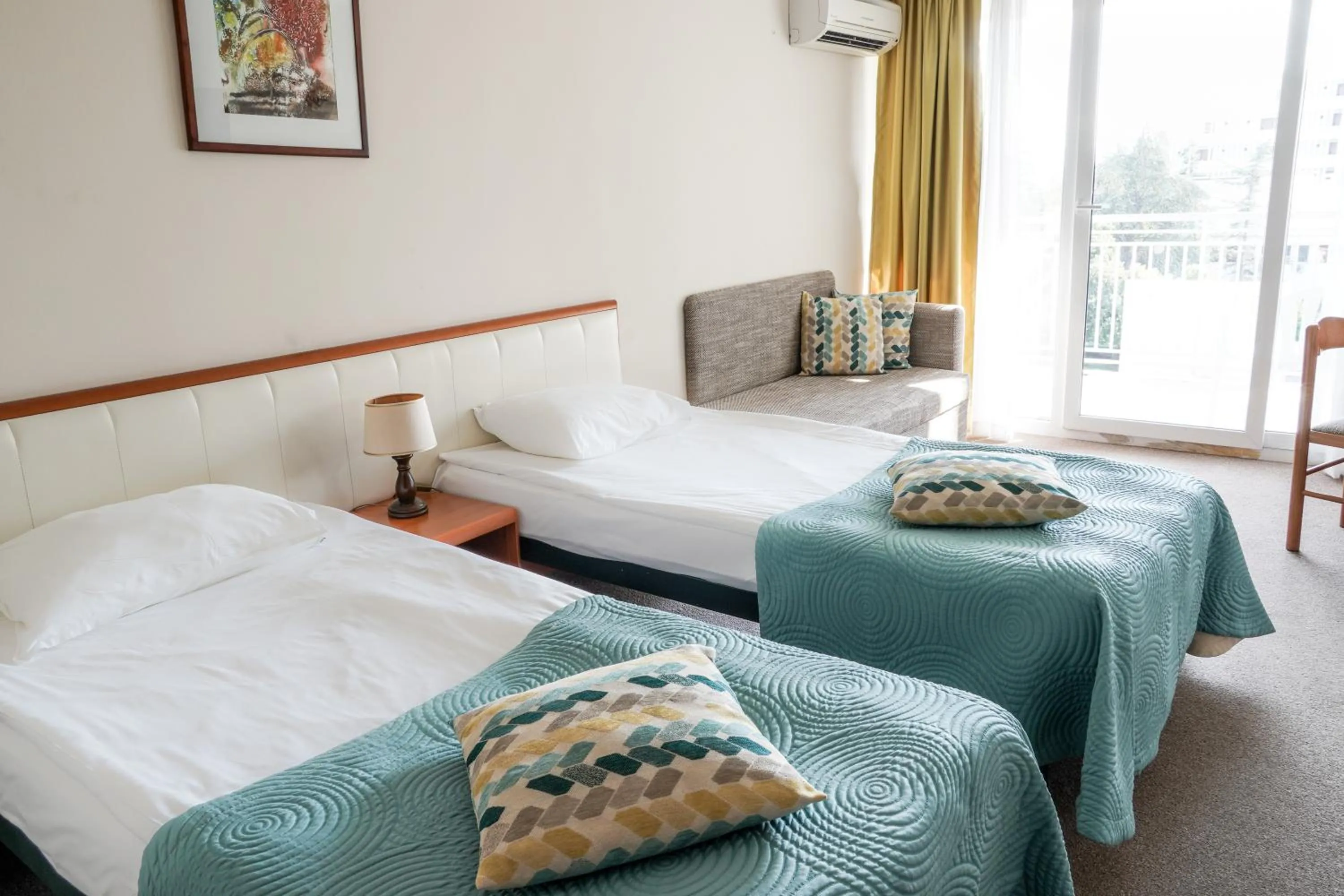 Bed in Hotel Laguna Garden