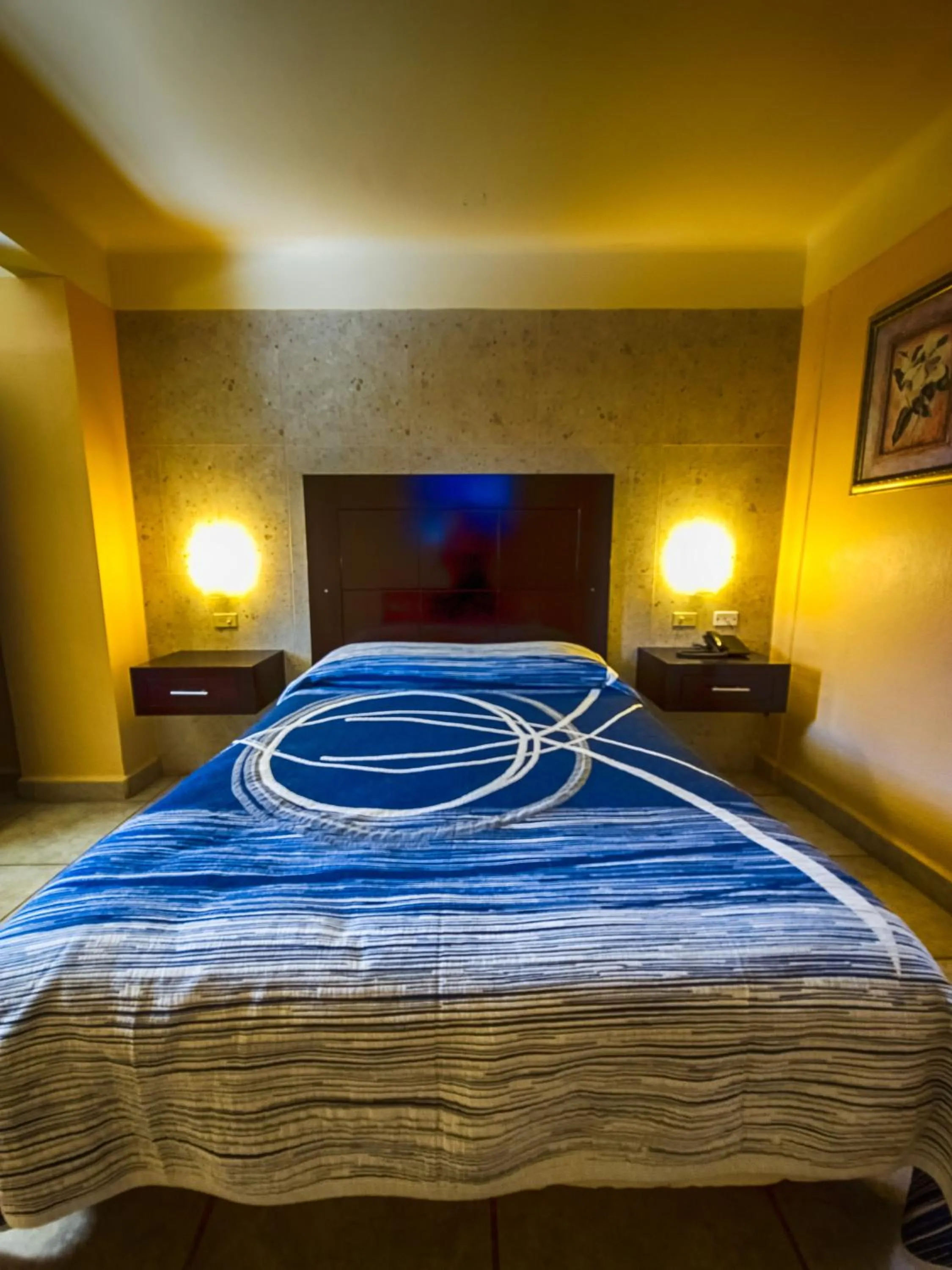 Bed in Hotel Oasis