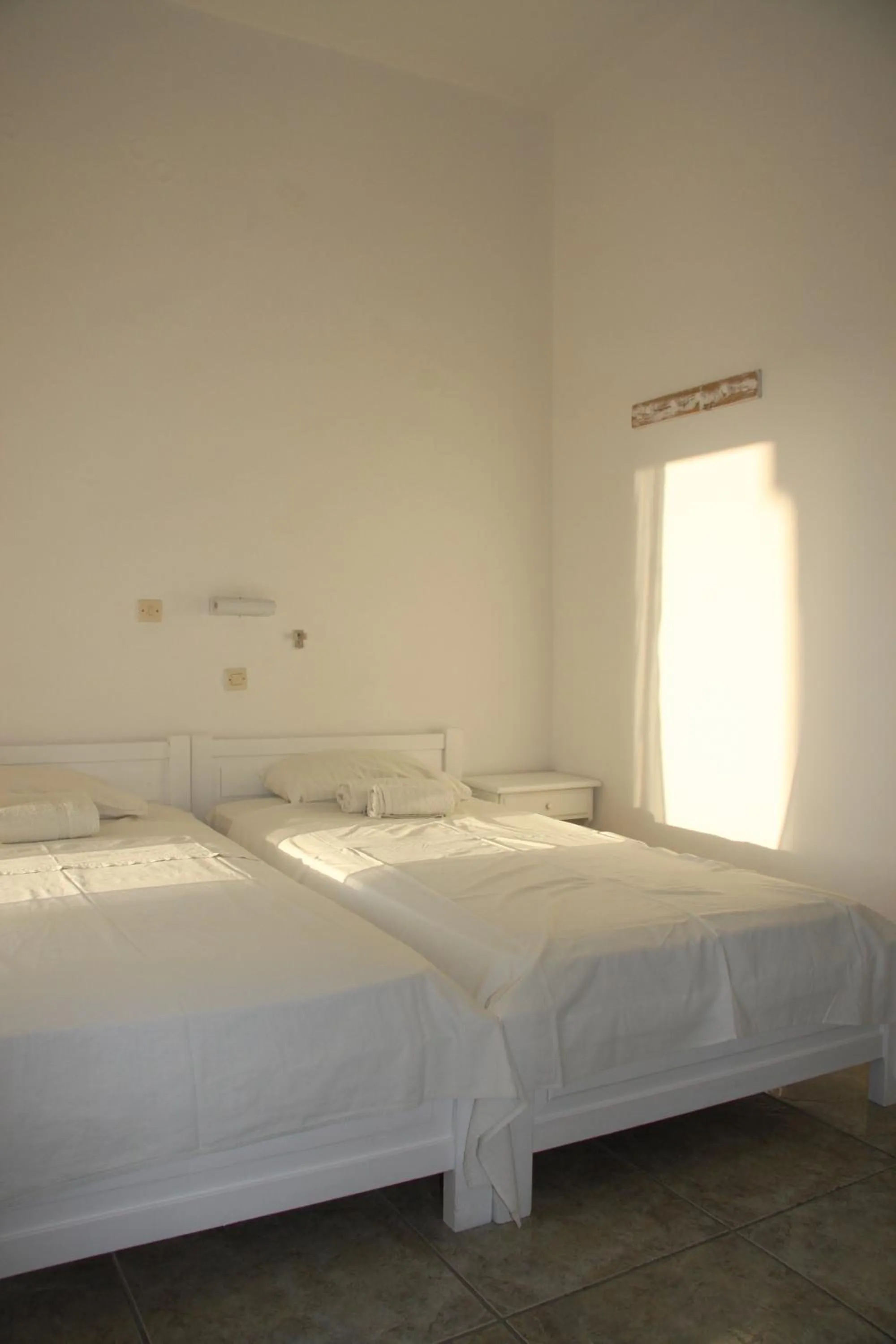 Photo of the whole room, Bed in Armadoros Hotel / Ios Backpackers